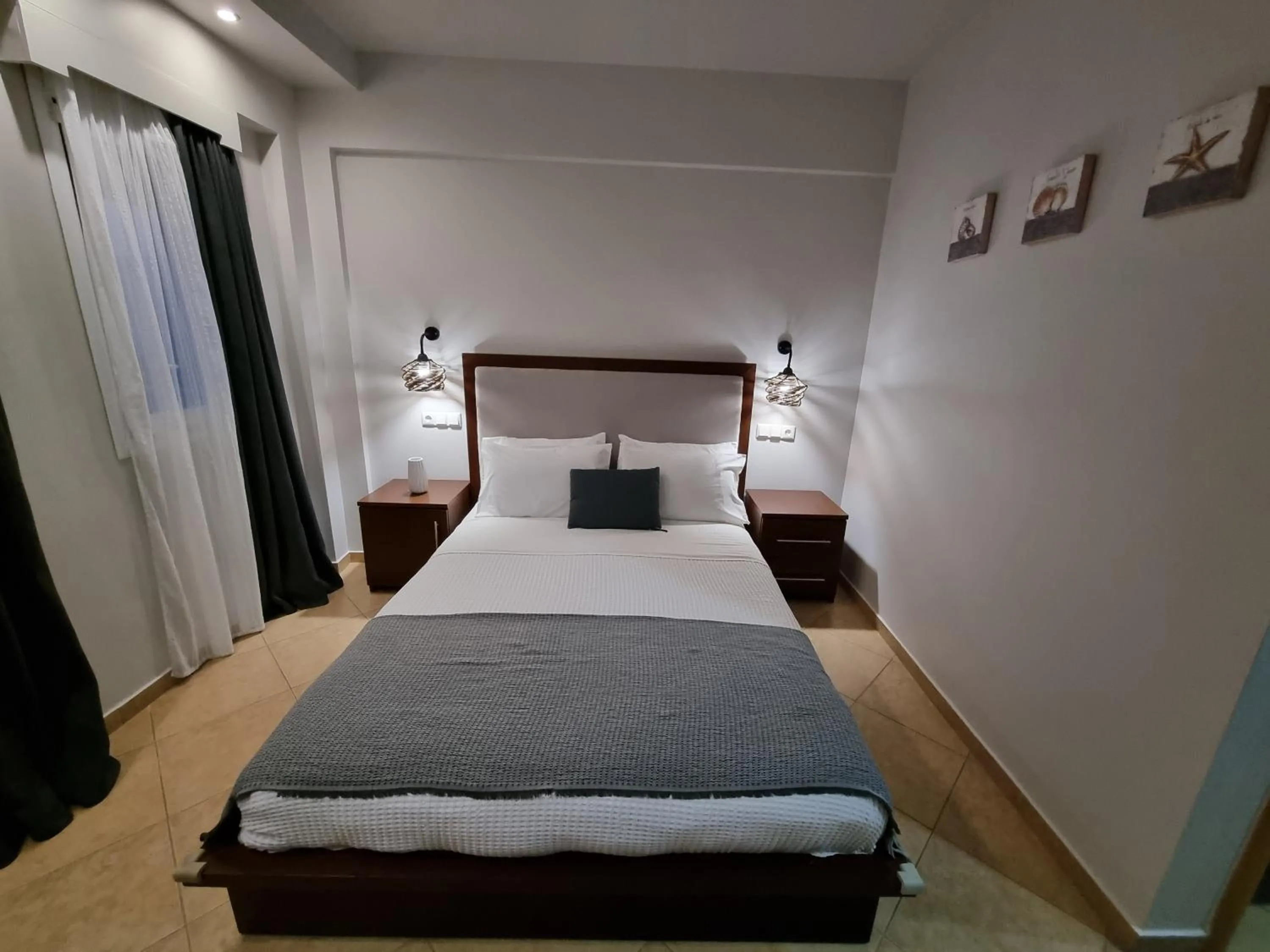 Bed in GreenHill Holiday Suites