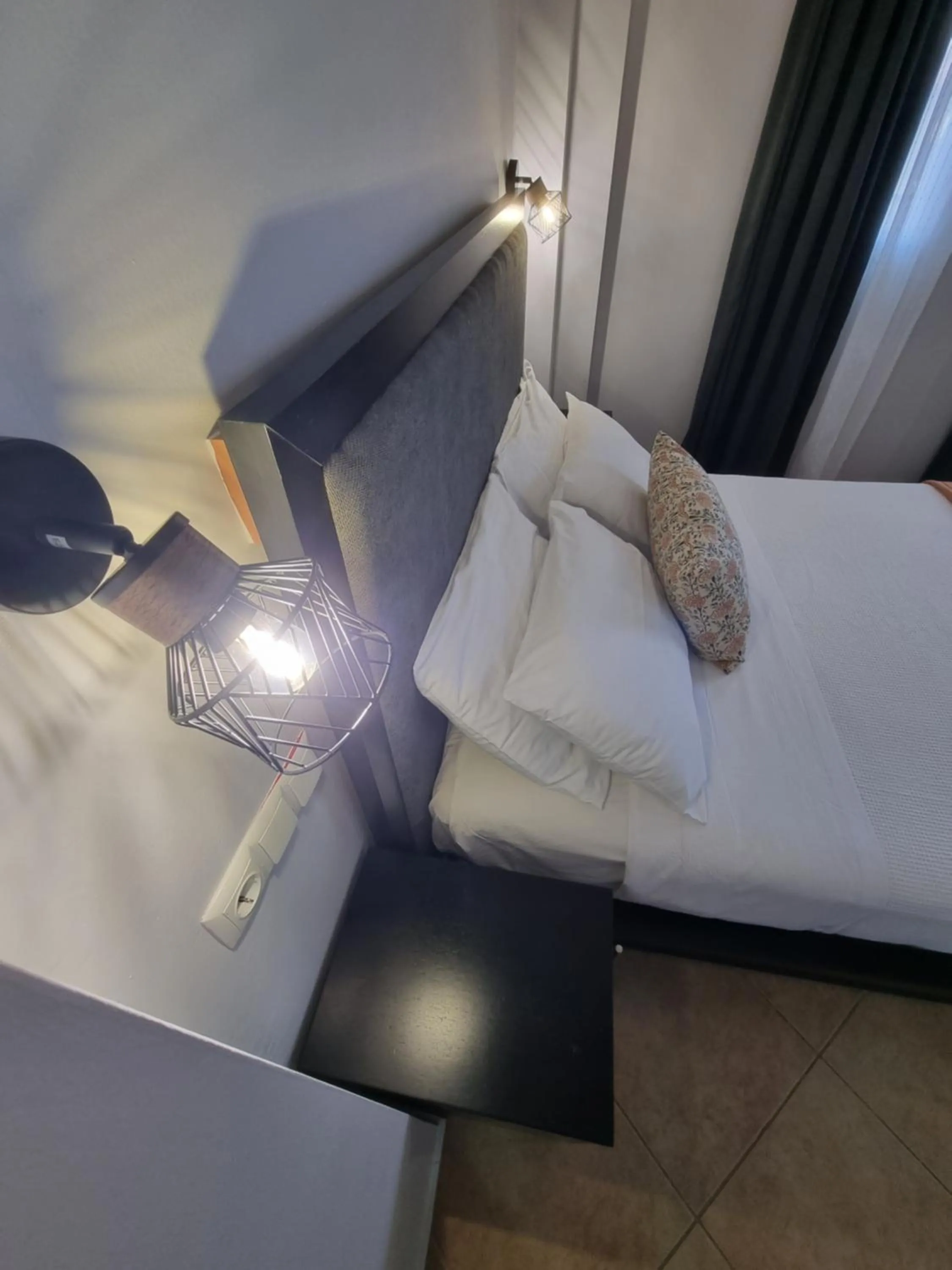 Bed in GreenHill Holiday Suites