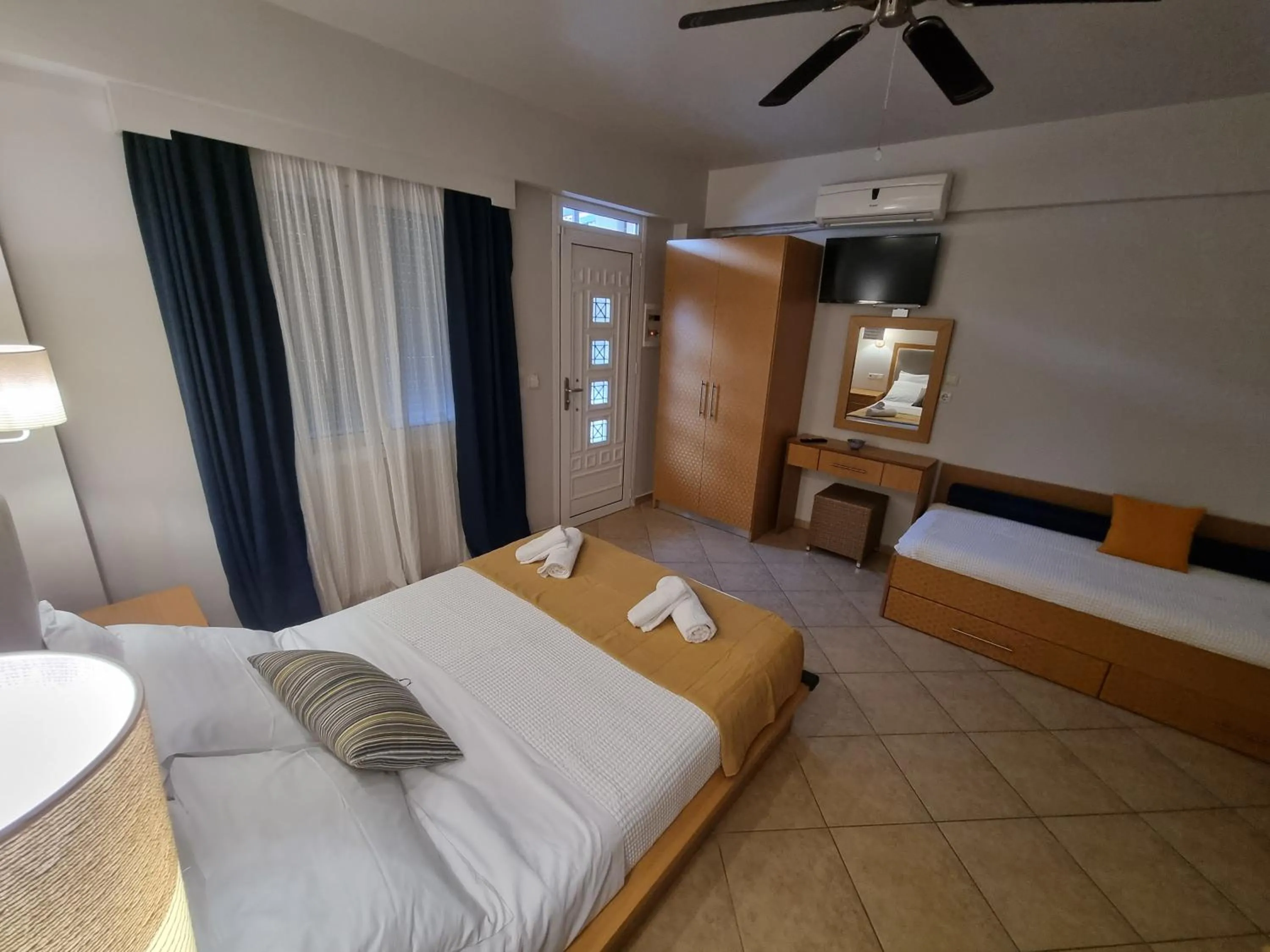Bed in GreenHill Holiday Suites