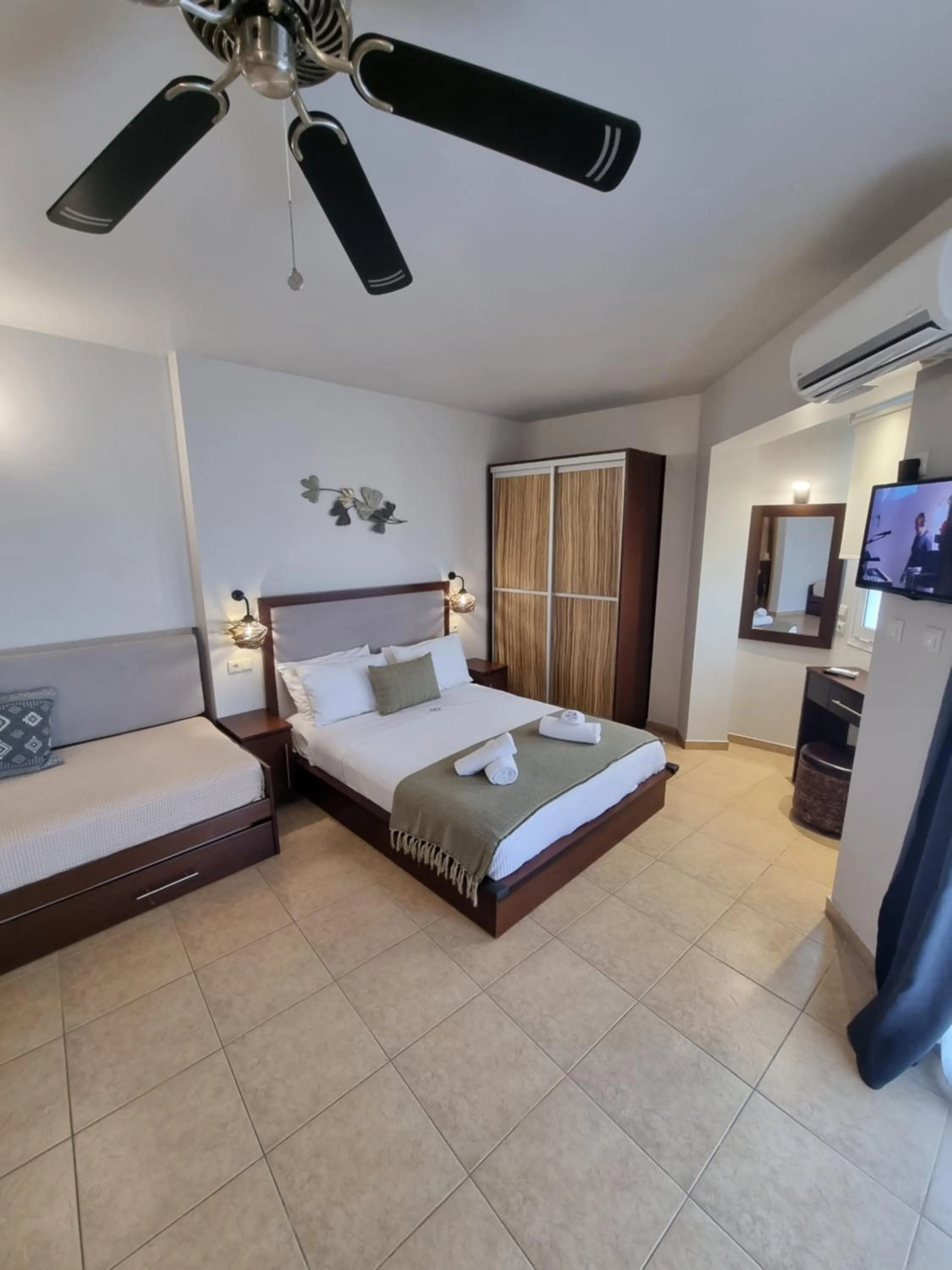 Bed in GreenHill Holiday Suites