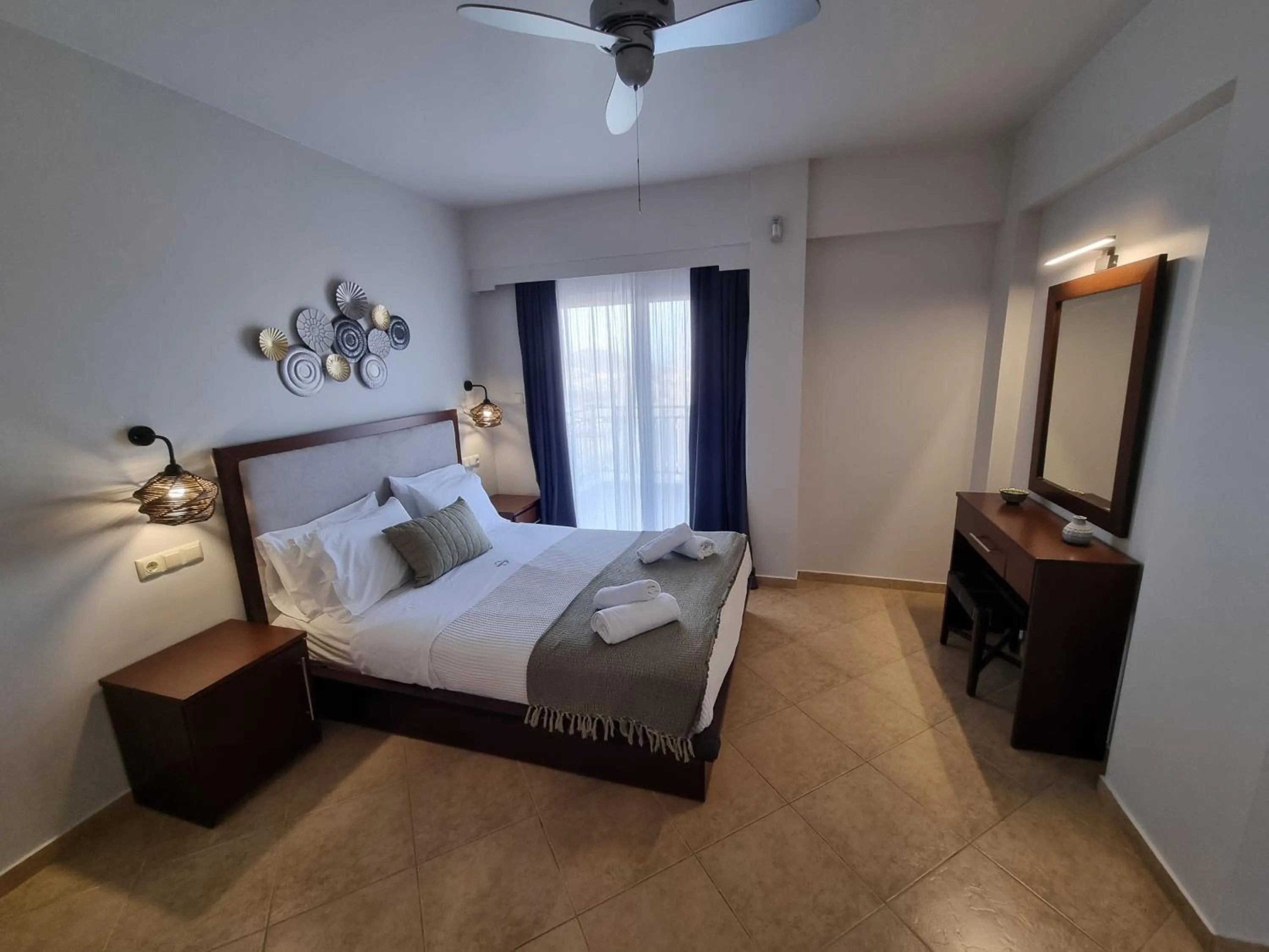 Bed in GreenHill Holiday Suites