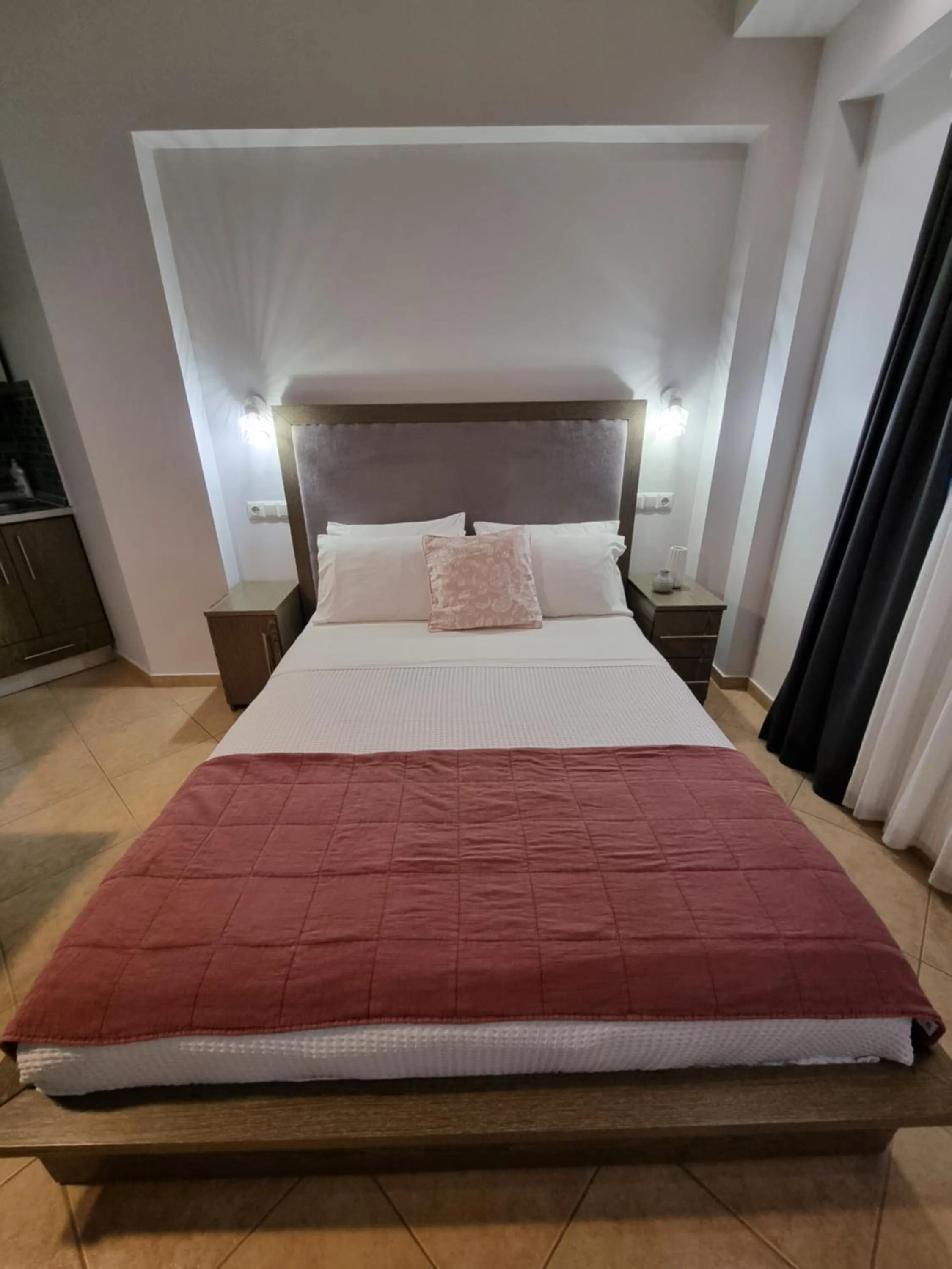 Bed in GreenHill Holiday Suites