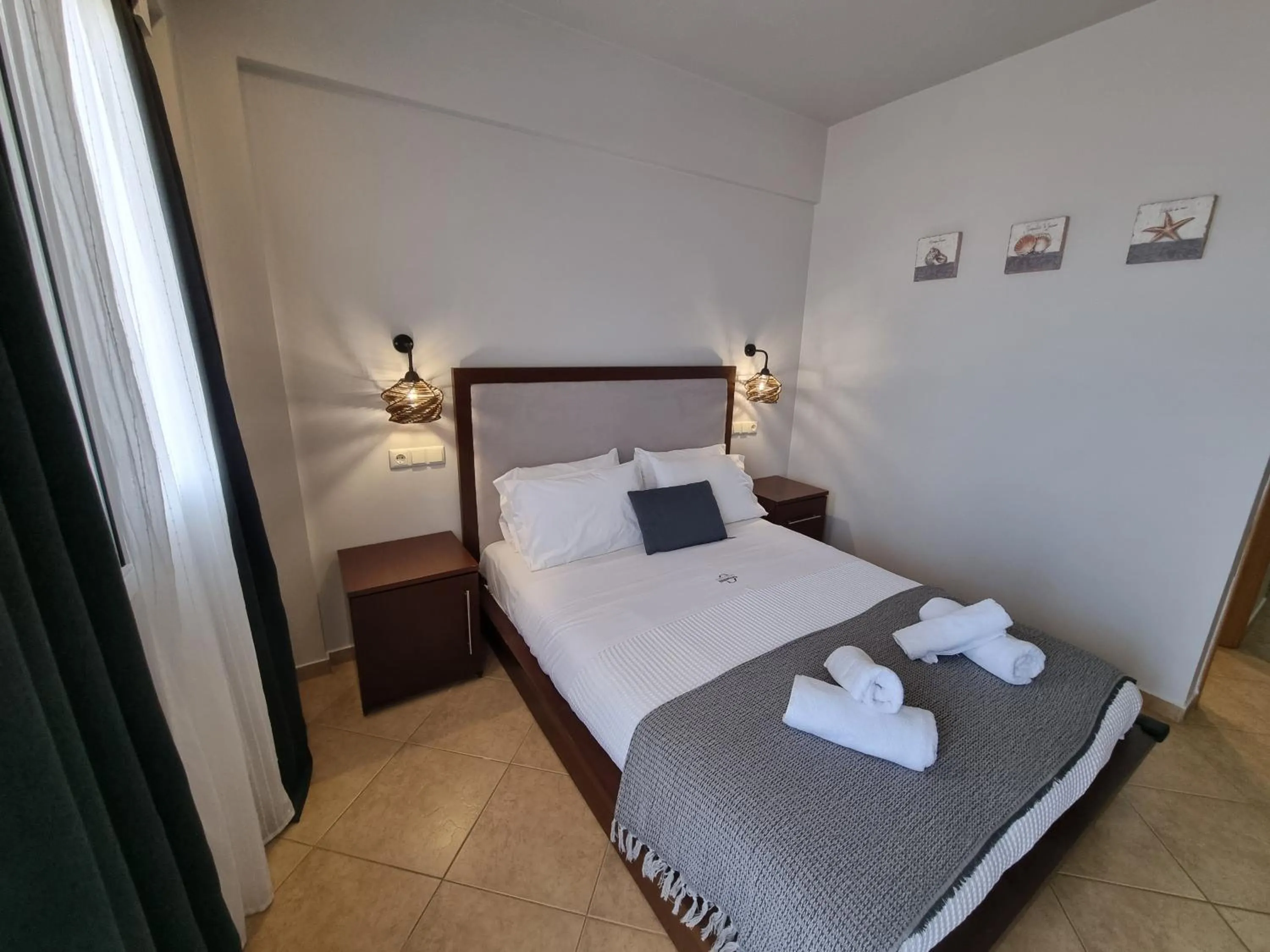 Bed in GreenHill Holiday Suites