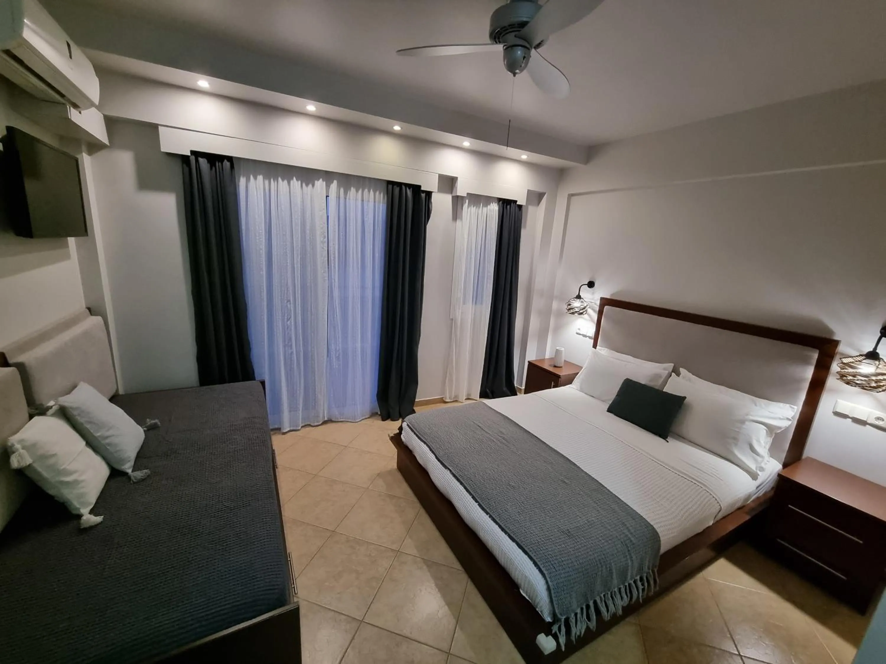 Bed in GreenHill Holiday Suites