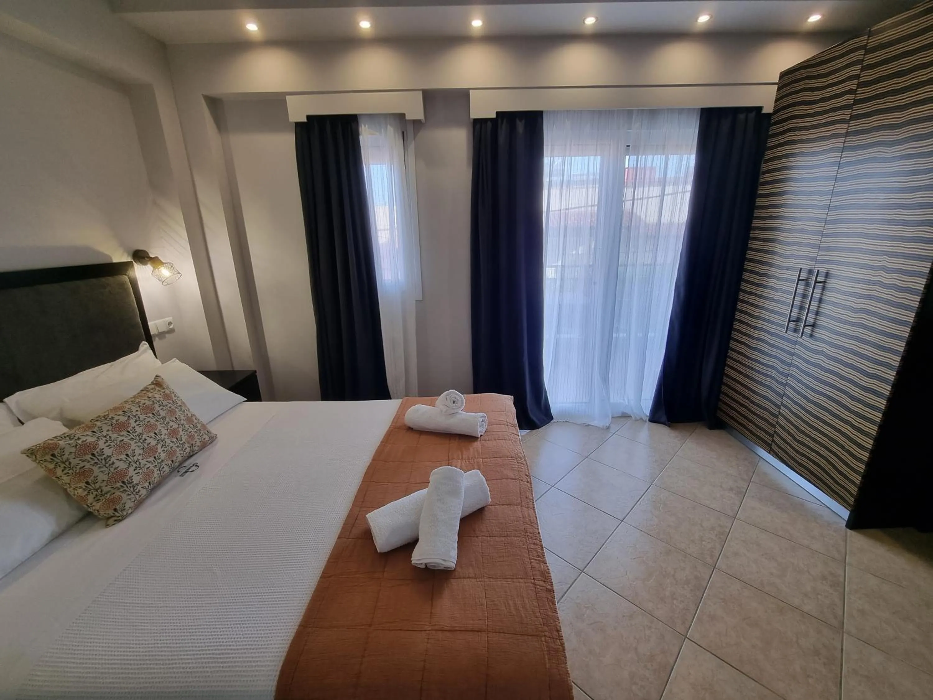 Bed in GreenHill Holiday Suites