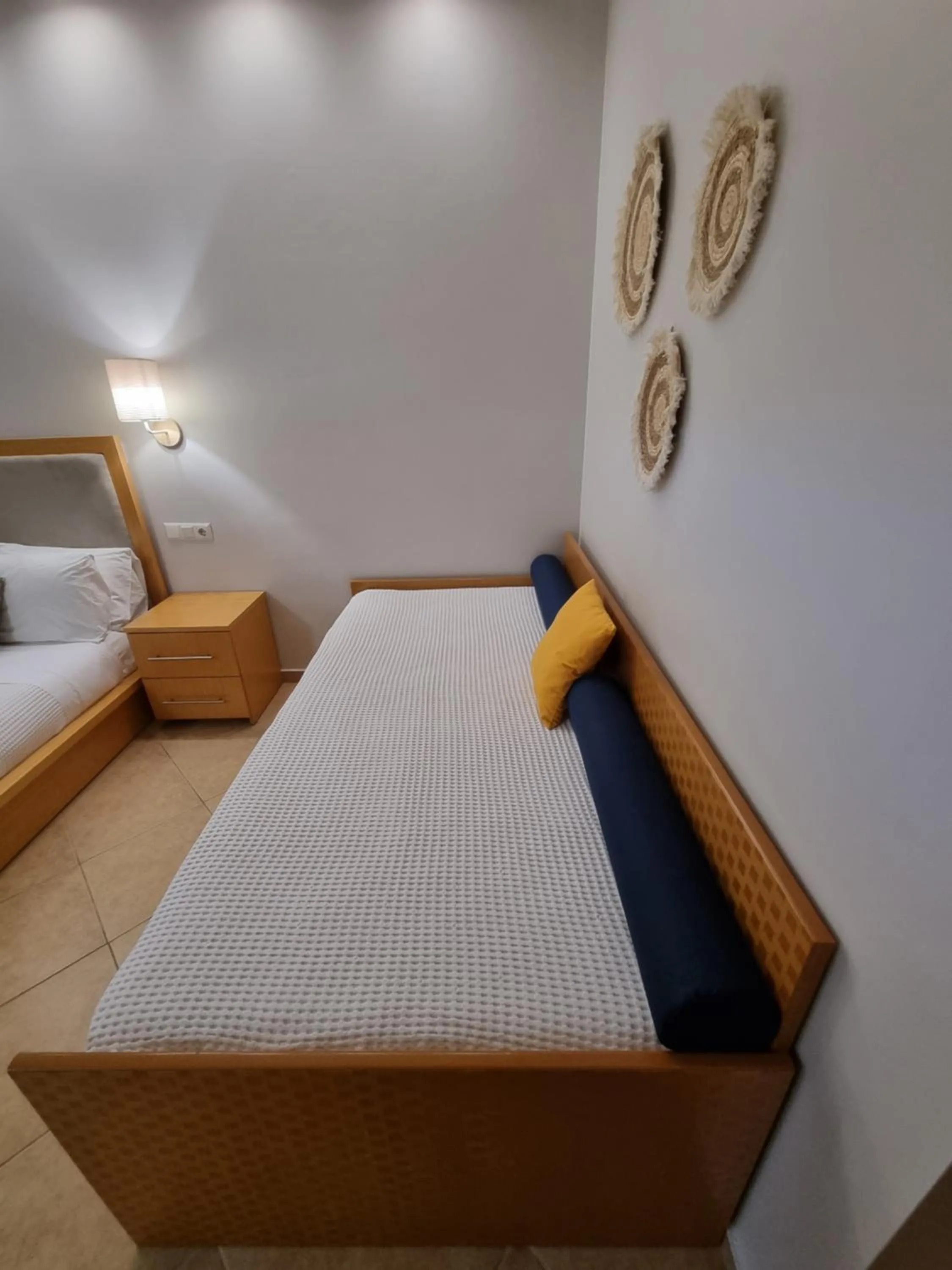Bed in GreenHill Holiday Suites