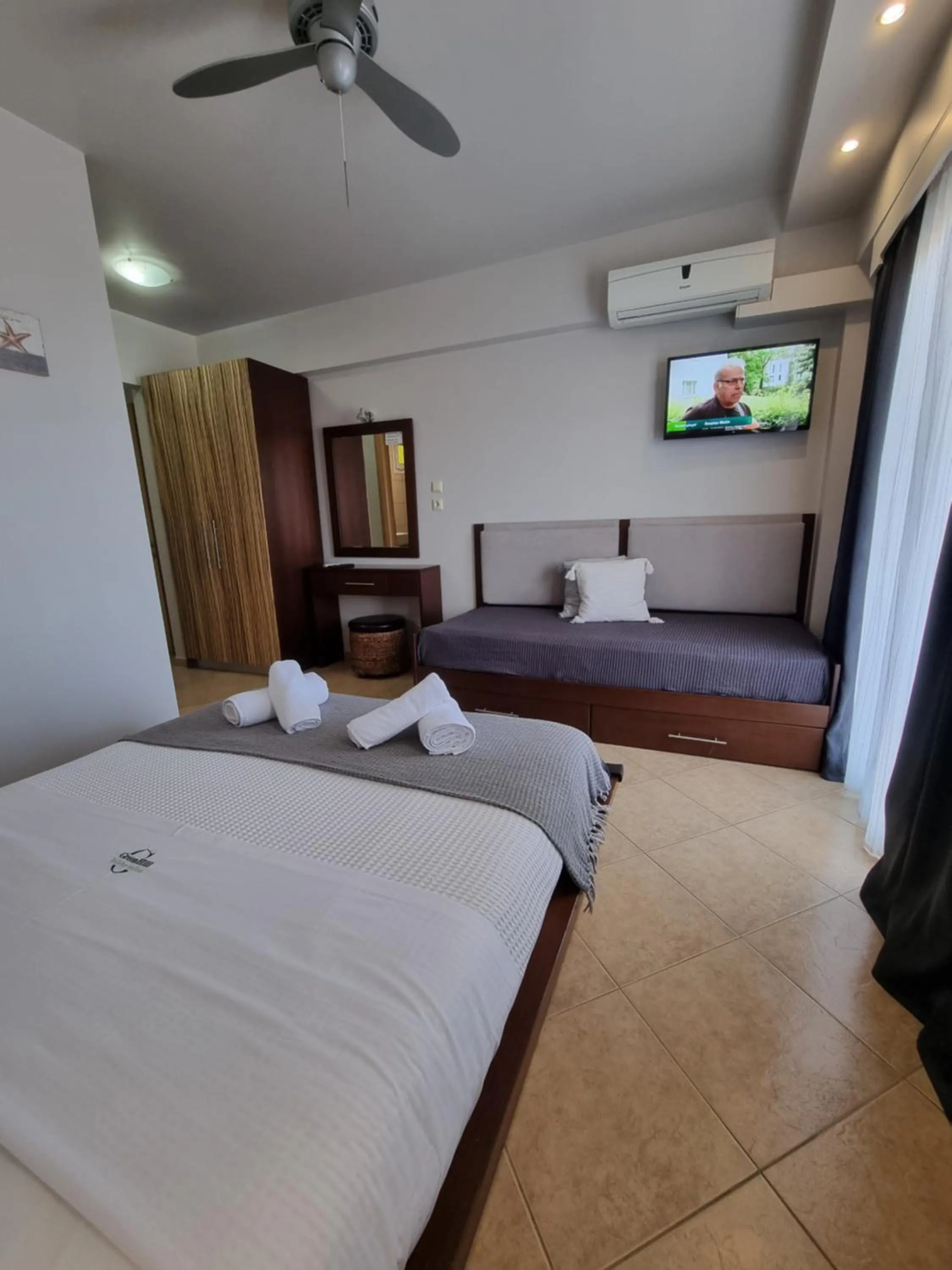 Bed in GreenHill Holiday Suites
