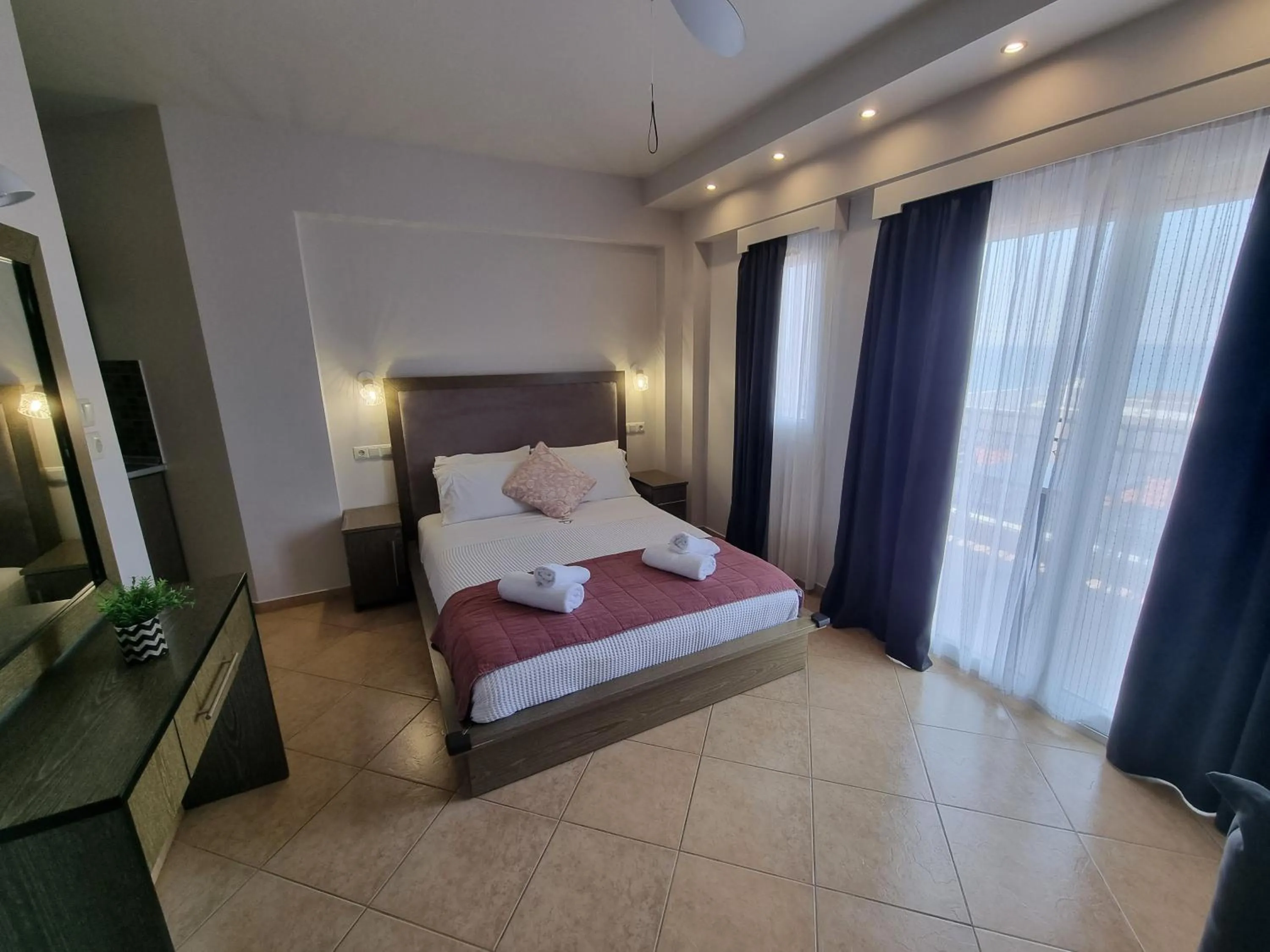Bed in GreenHill Holiday Suites