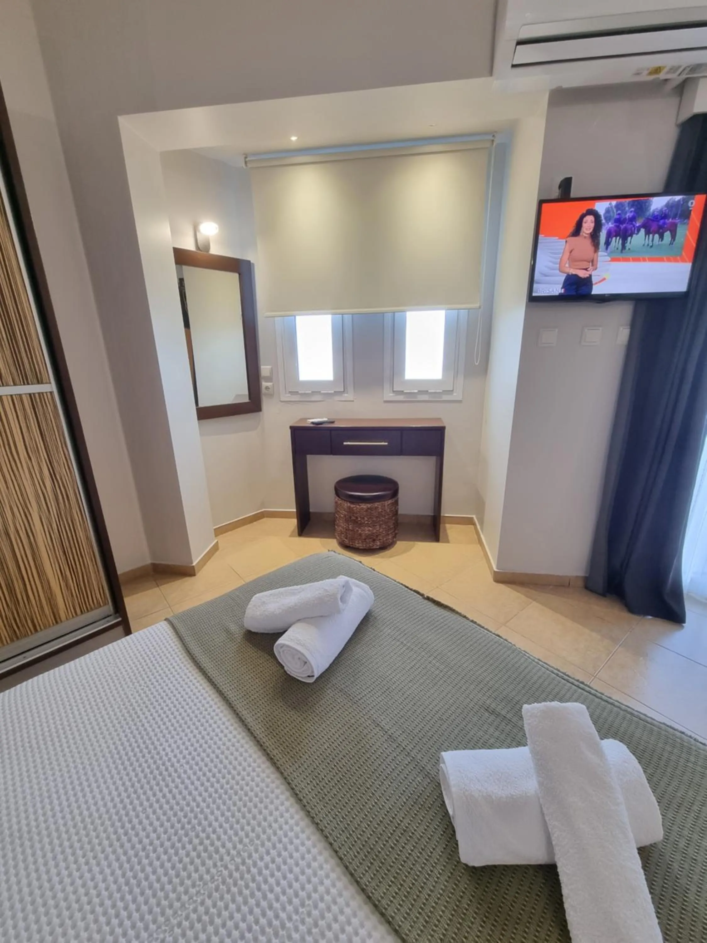 Bed in GreenHill Holiday Suites