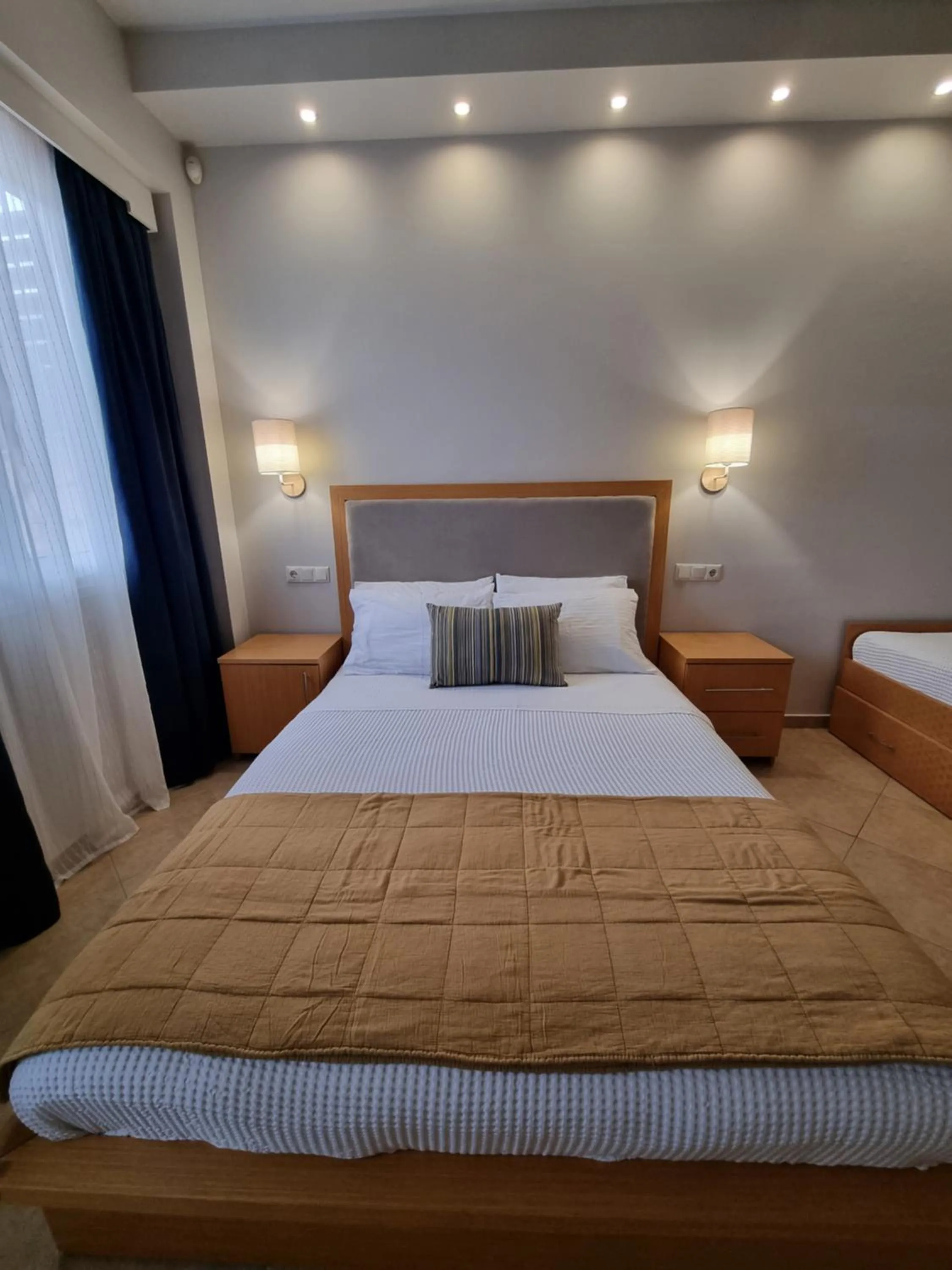 Bed in GreenHill Holiday Suites