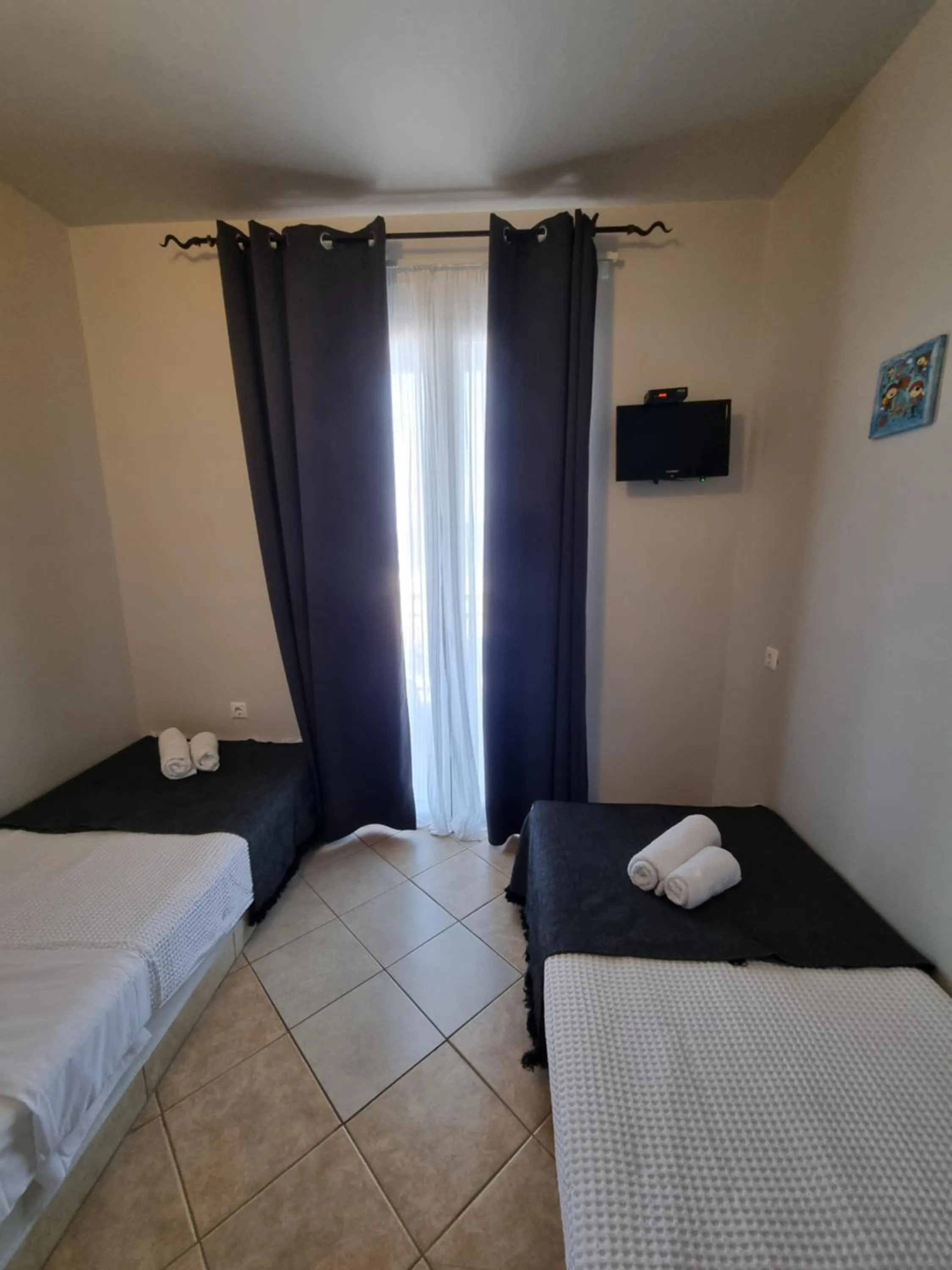 Bed in GreenHill Holiday Suites