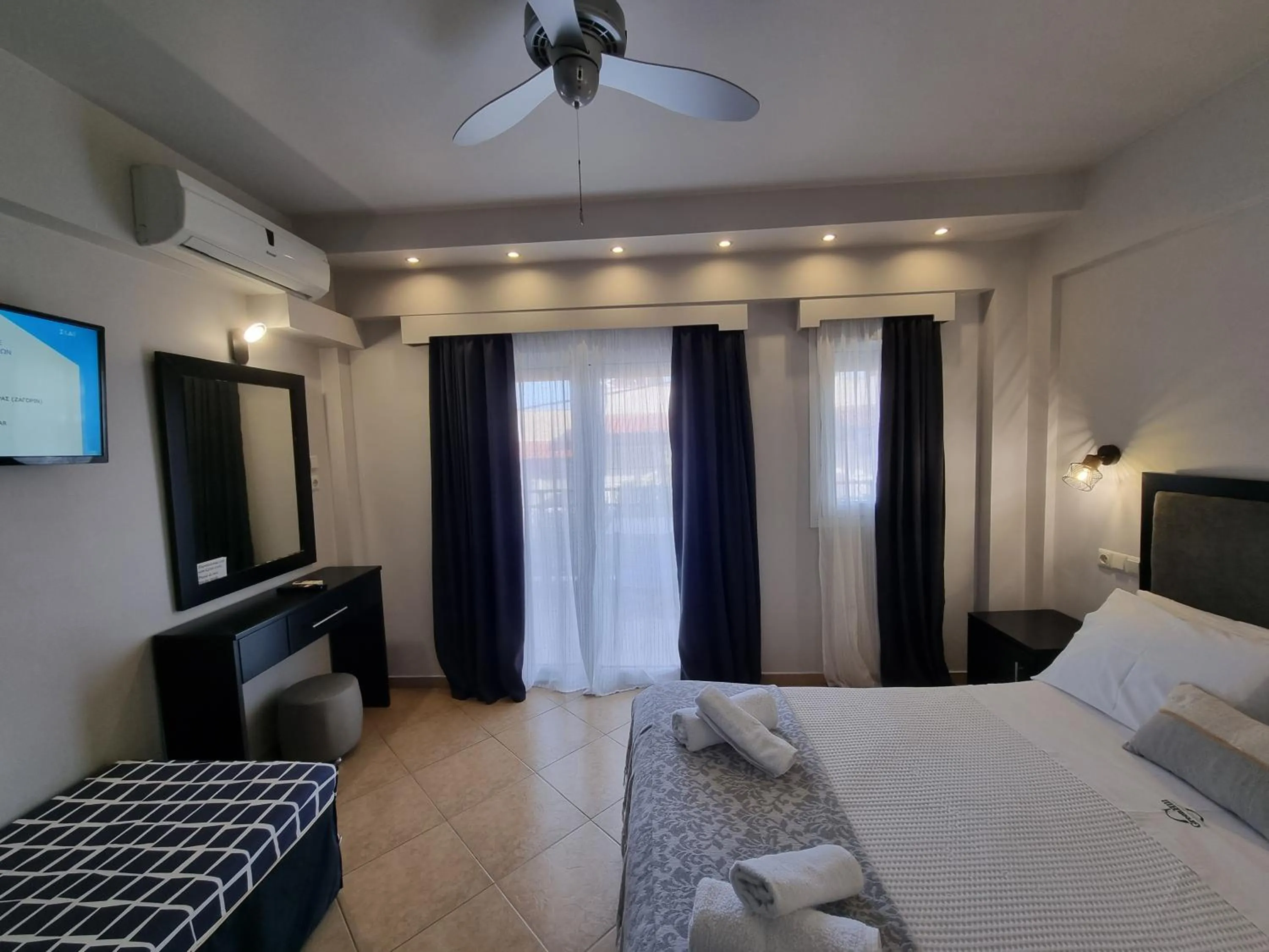 Bed in GreenHill Holiday Suites