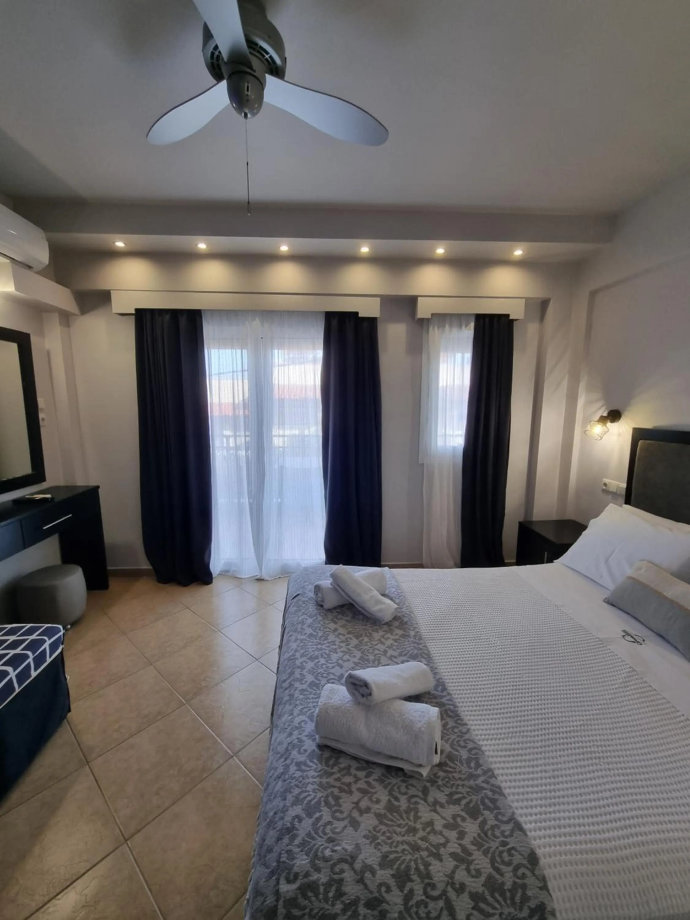 Bed in GreenHill Holiday Suites