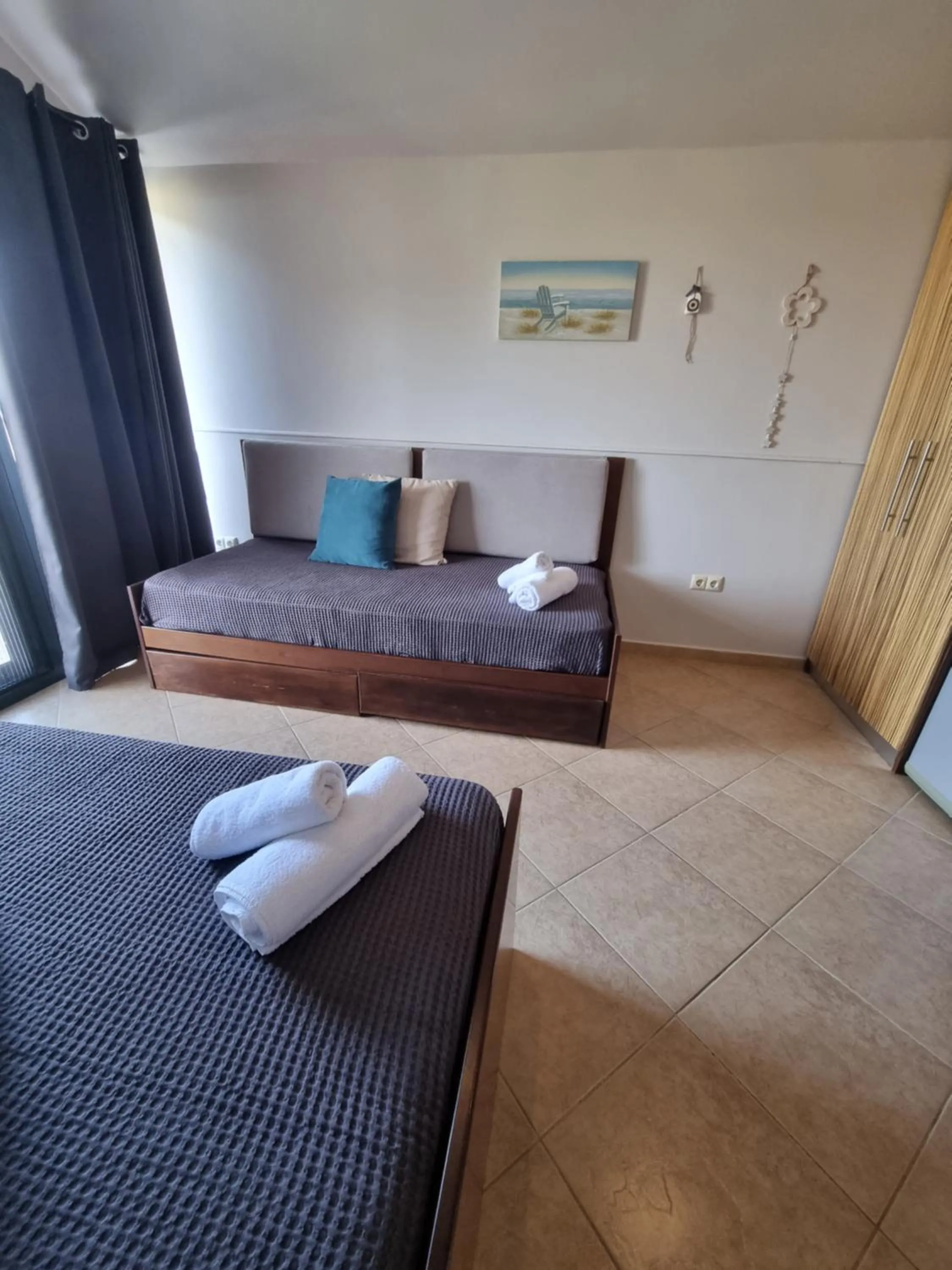 Bed in GreenHill Holiday Suites