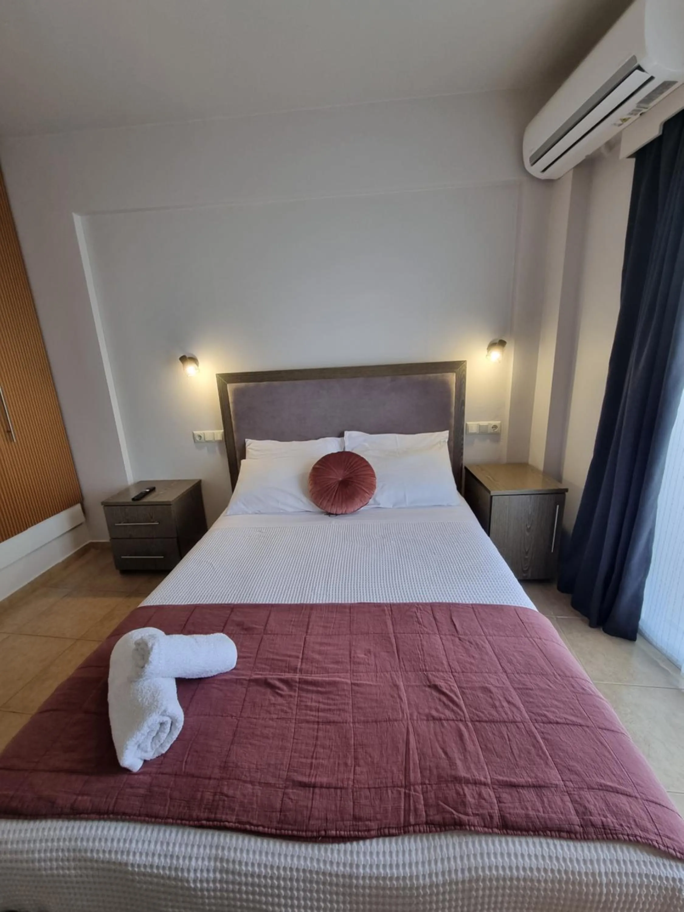 Bed in GreenHill Holiday Suites