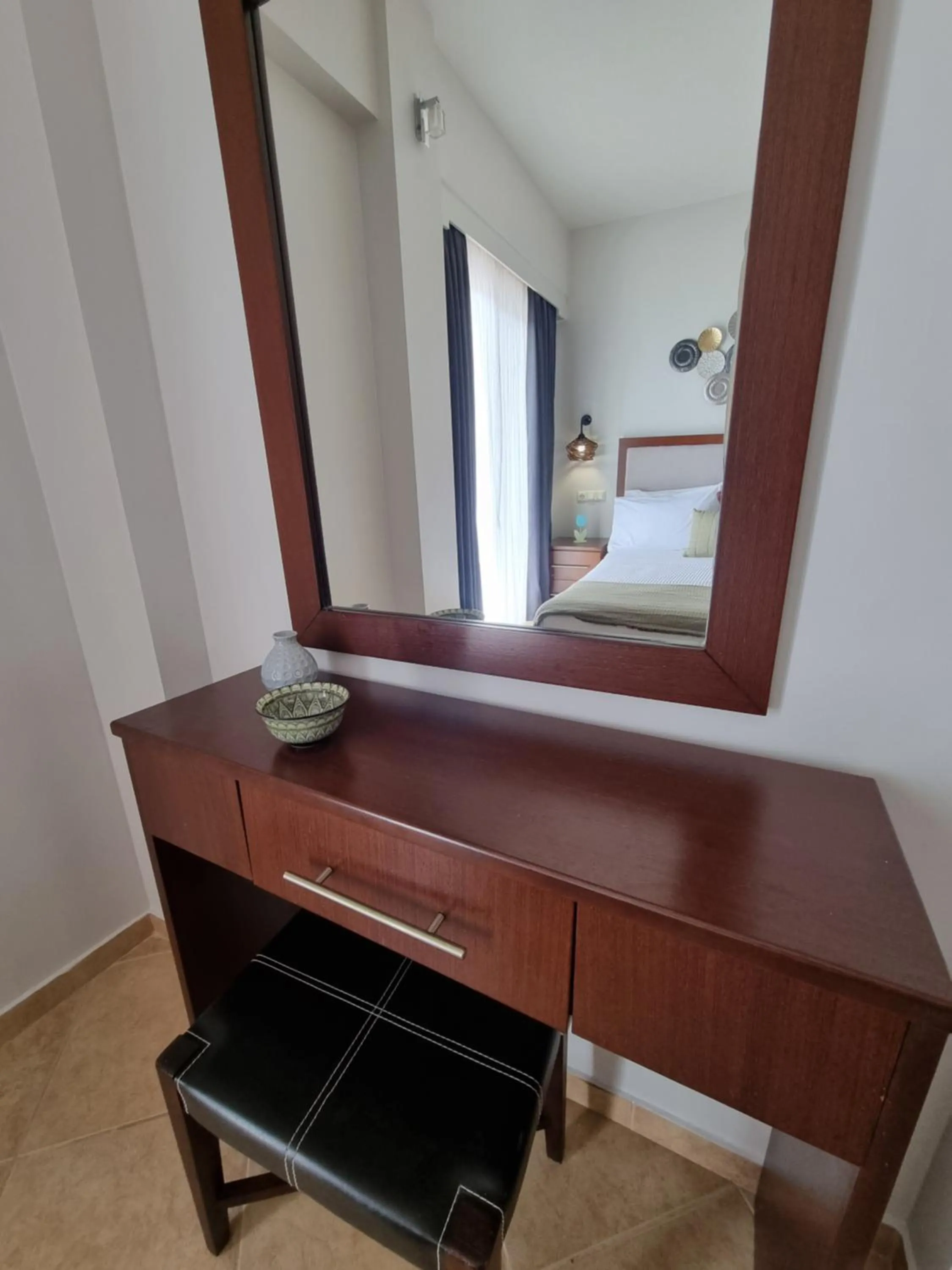 Bed in GreenHill Holiday Suites