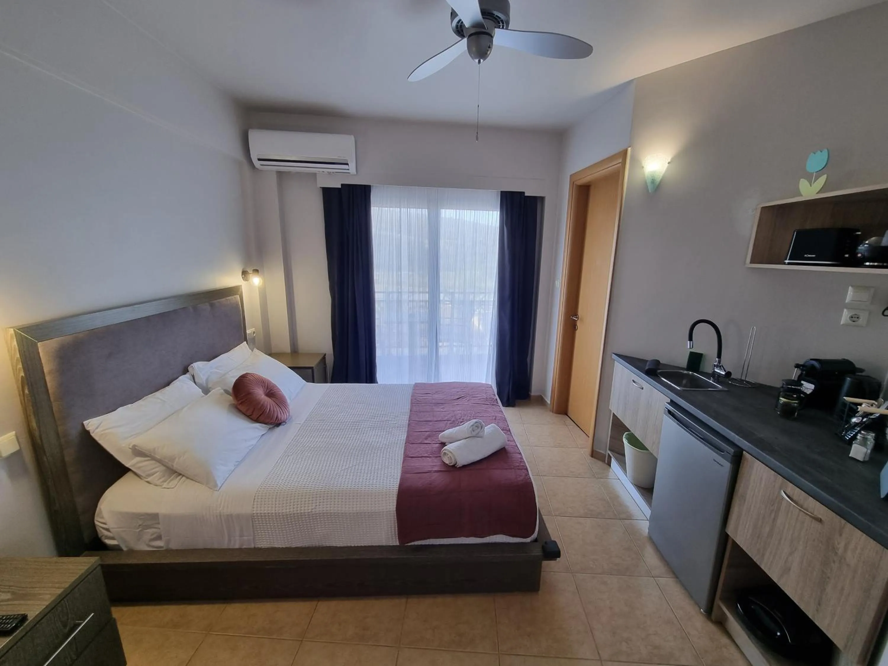 Bed in GreenHill Holiday Suites