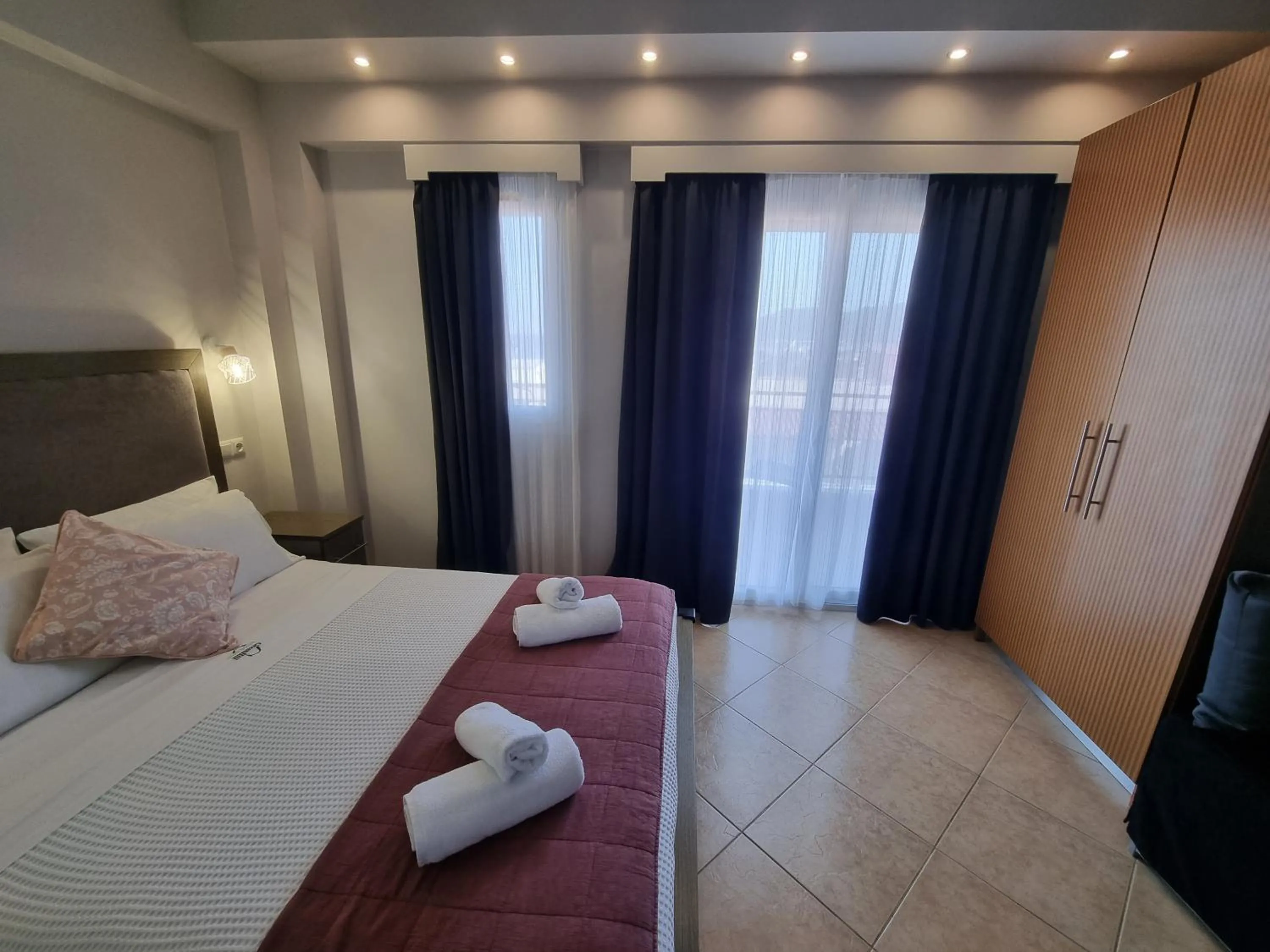 Bed in GreenHill Holiday Suites
