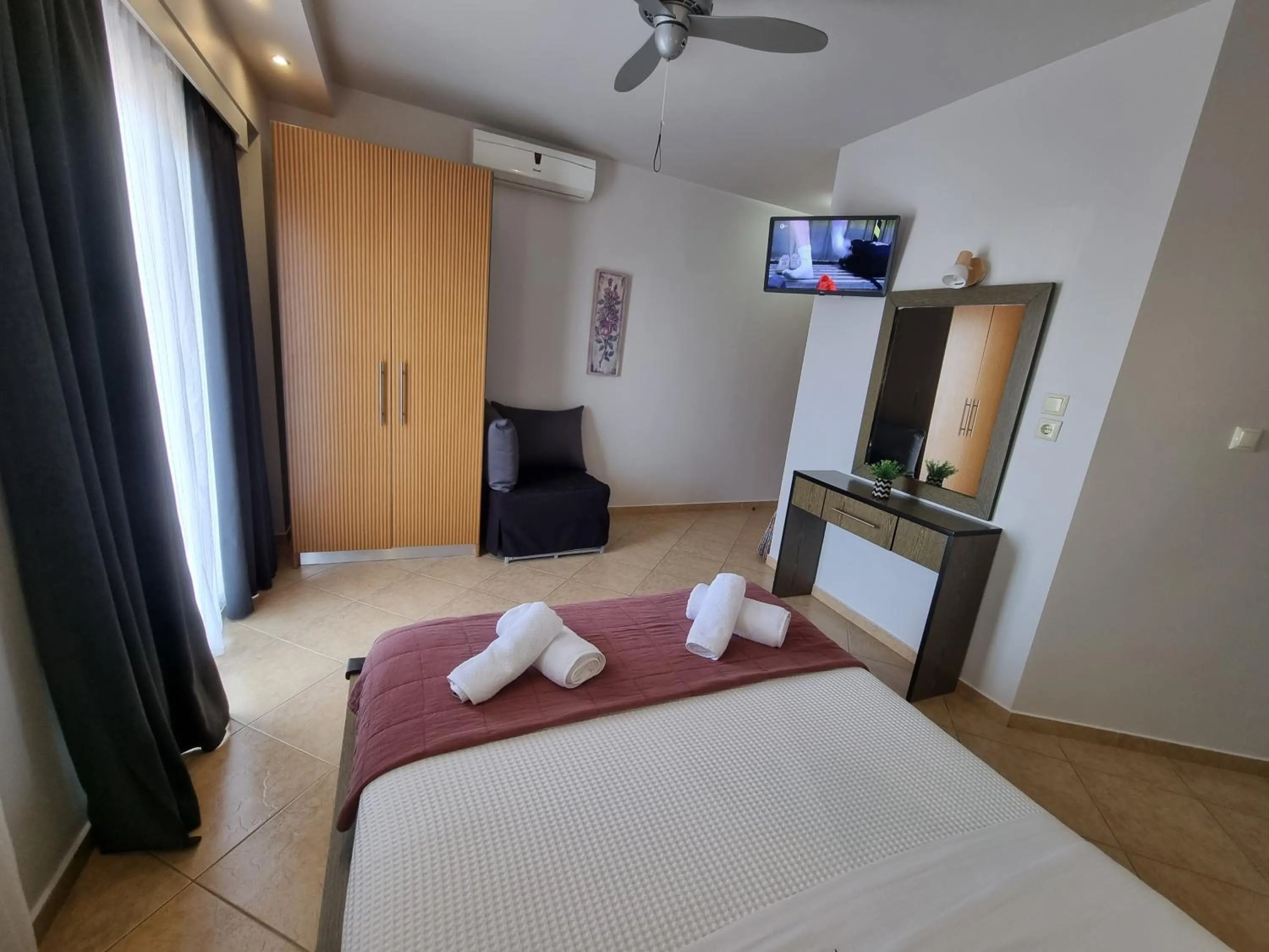 Bed in GreenHill Holiday Suites