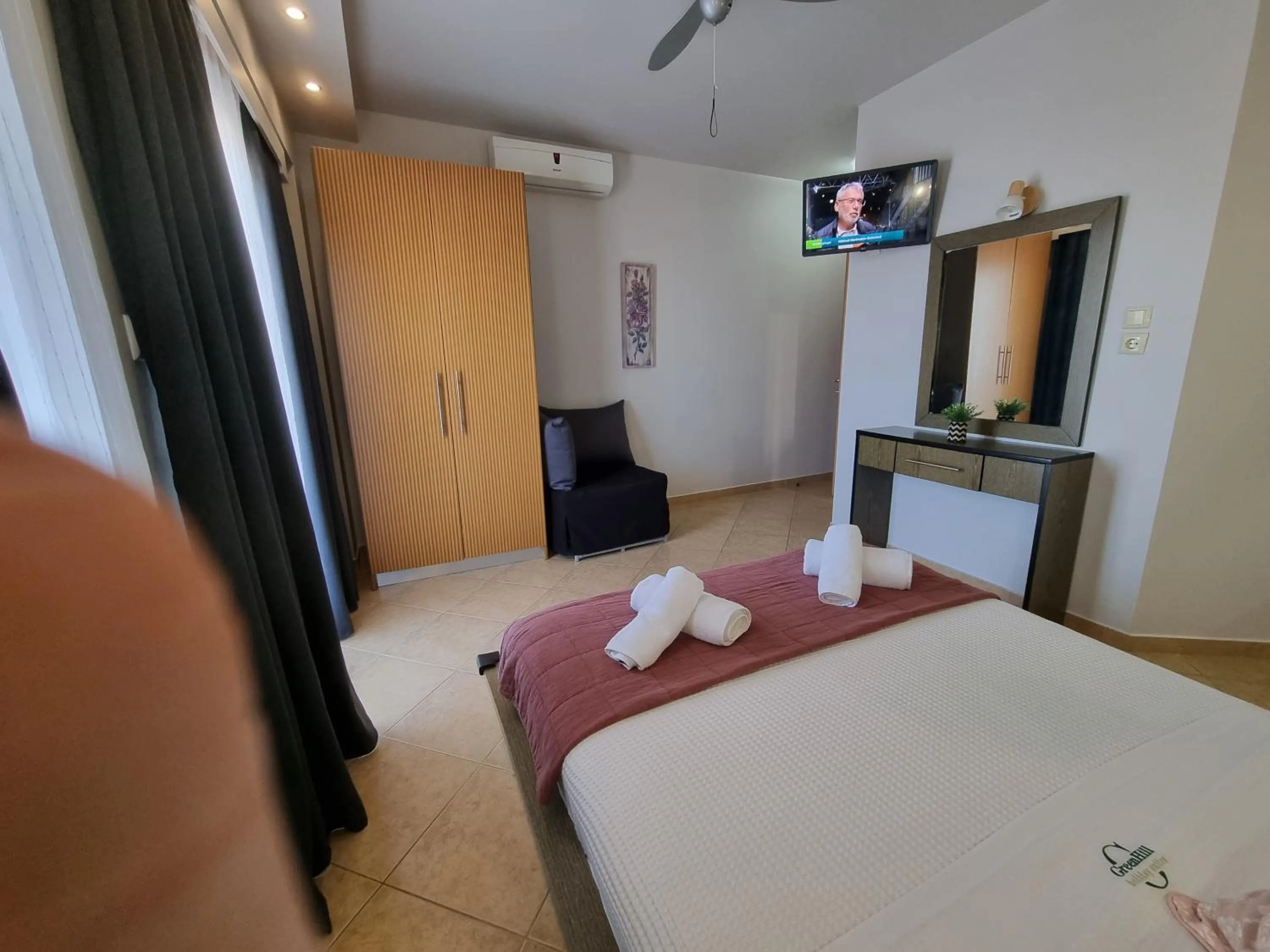 Bed in GreenHill Holiday Suites