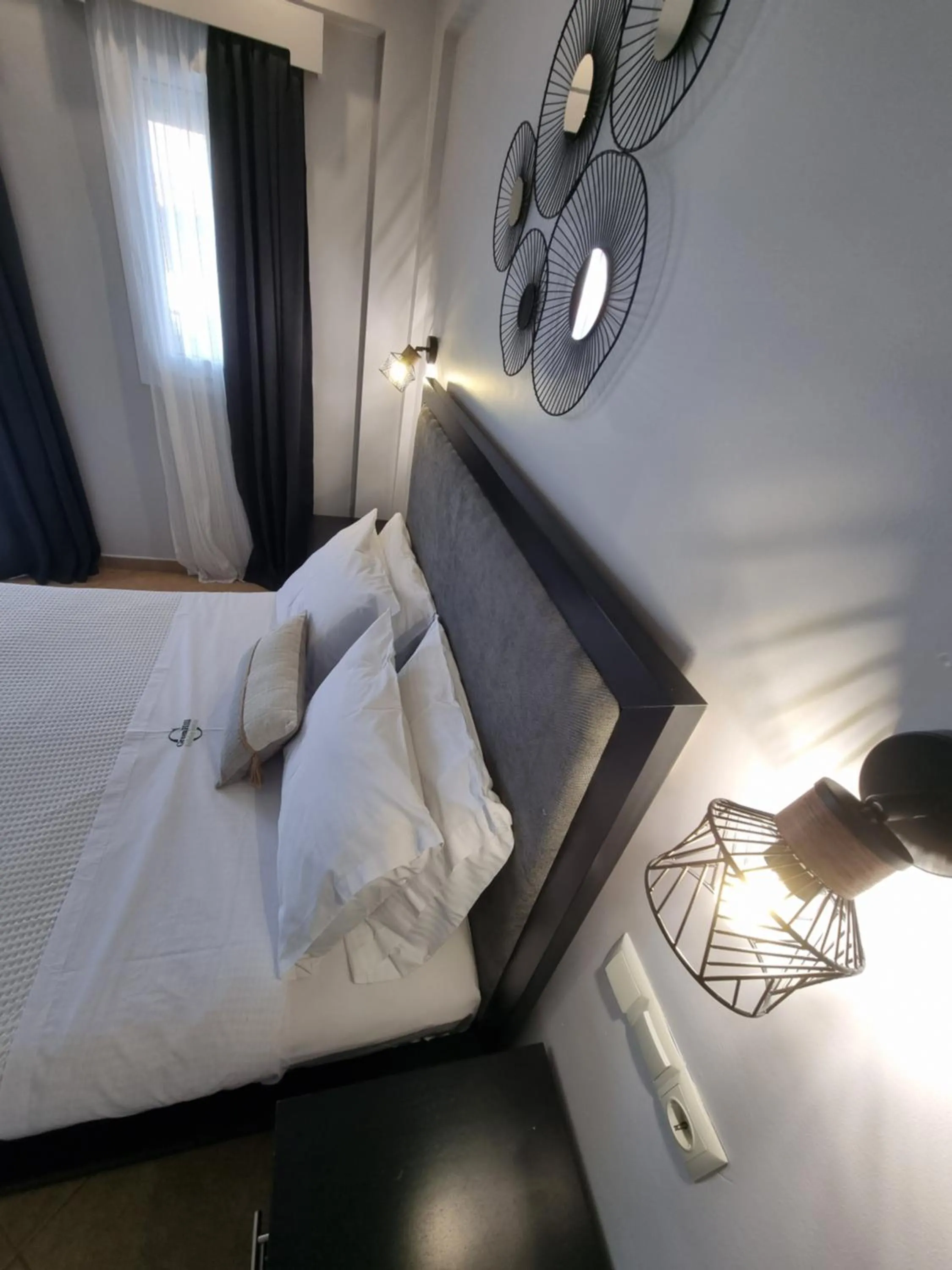 Bed in GreenHill Holiday Suites