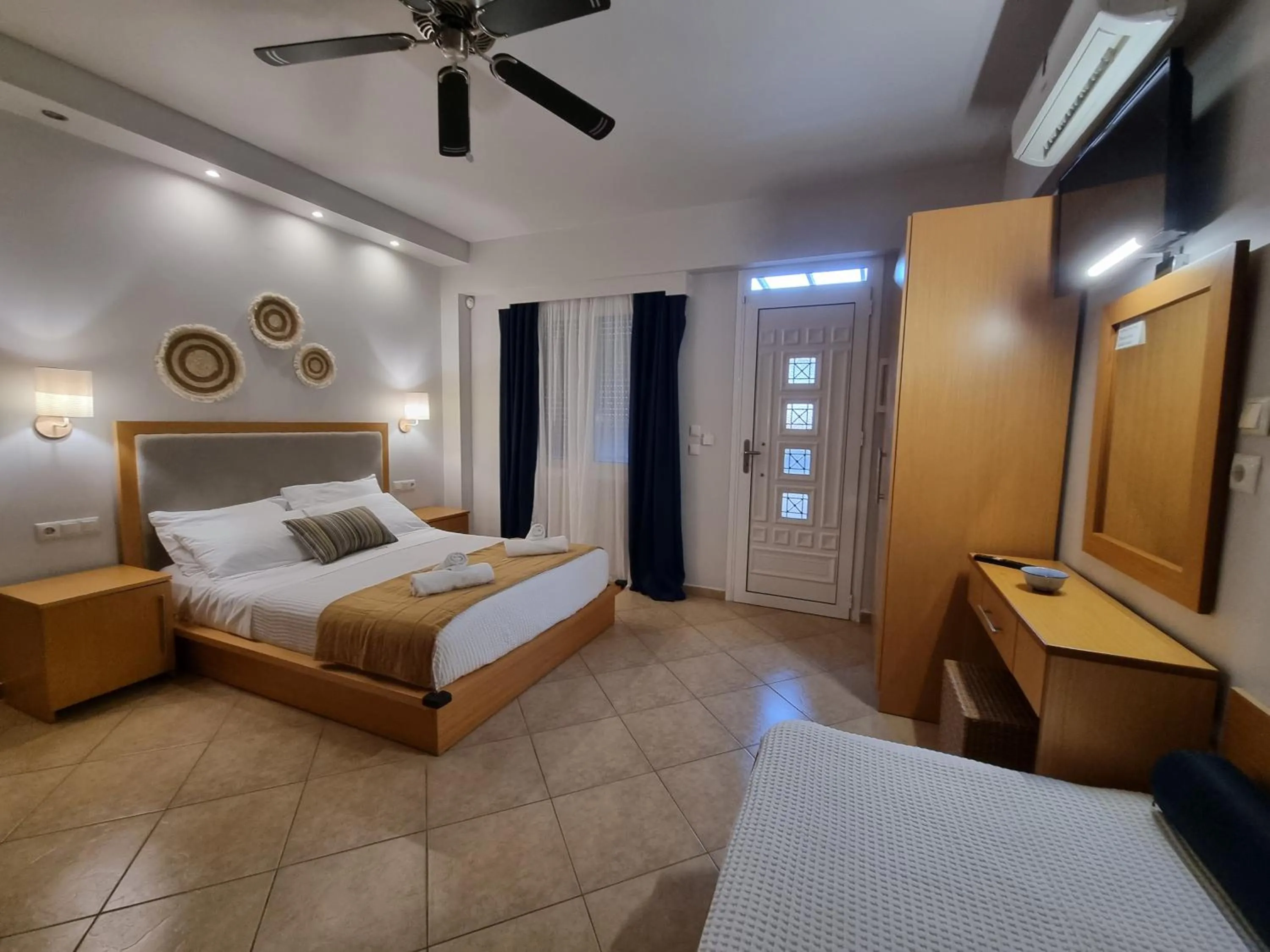 Bed in GreenHill Holiday Suites