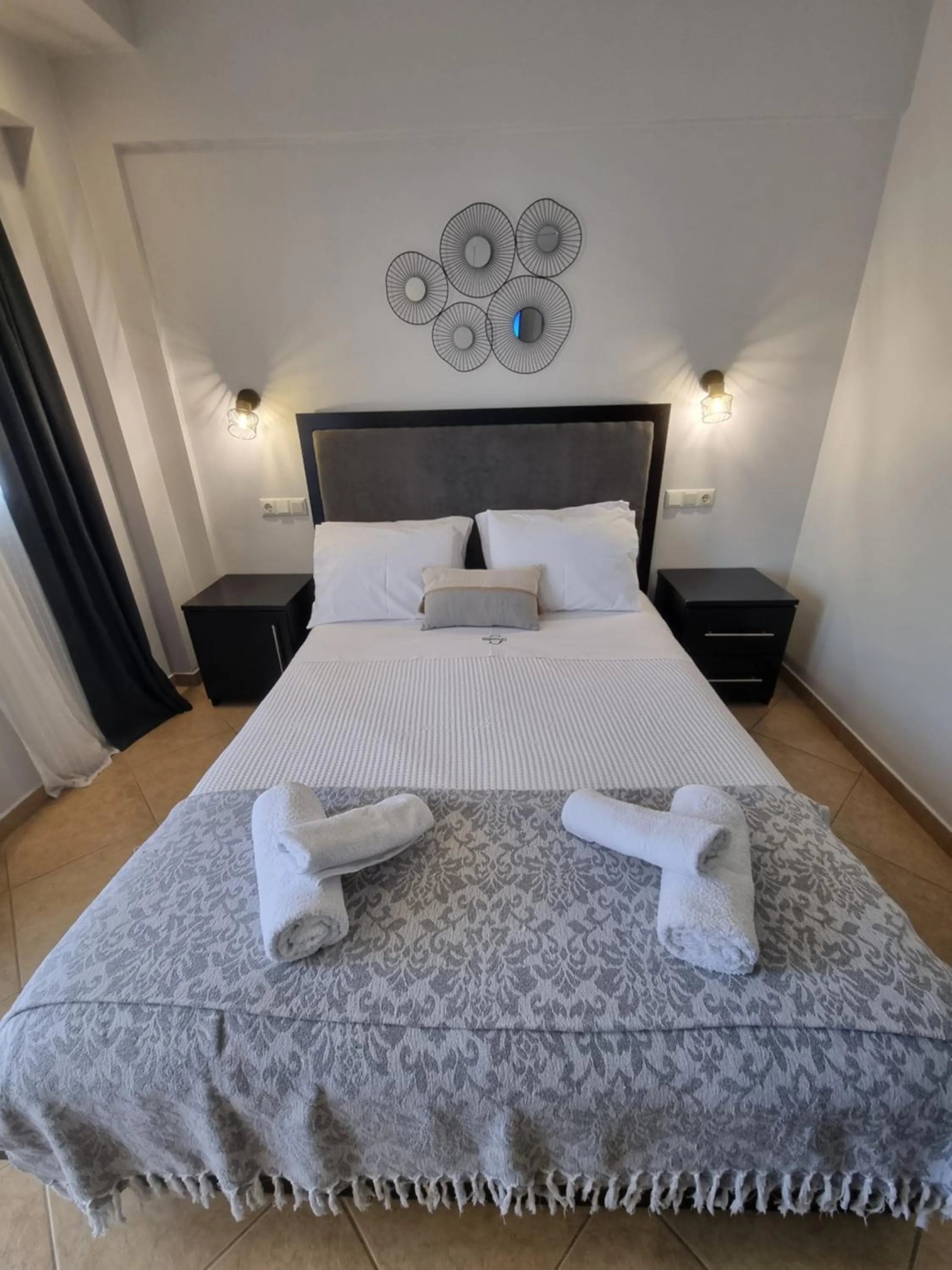 Bed in GreenHill Holiday Suites