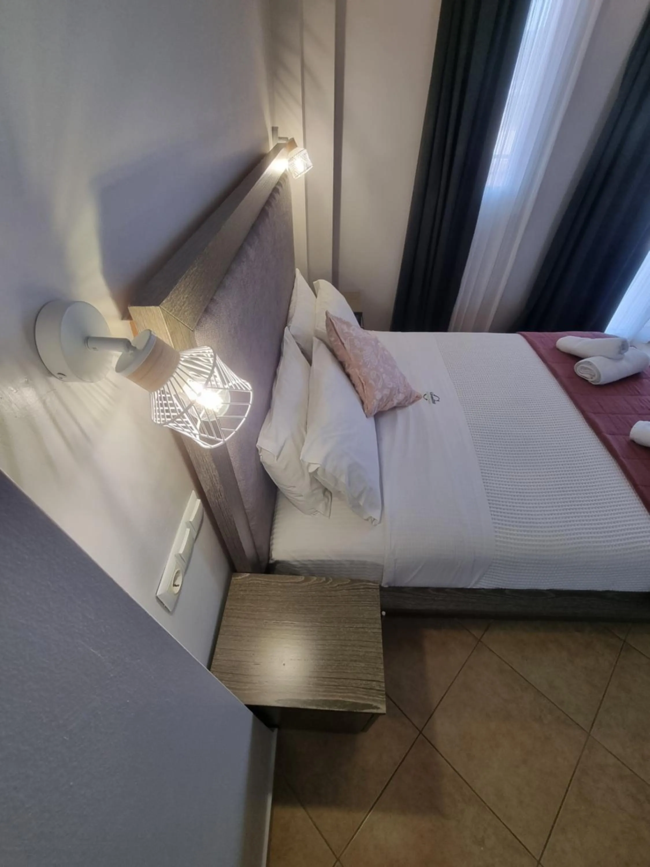Bed in GreenHill Holiday Suites
