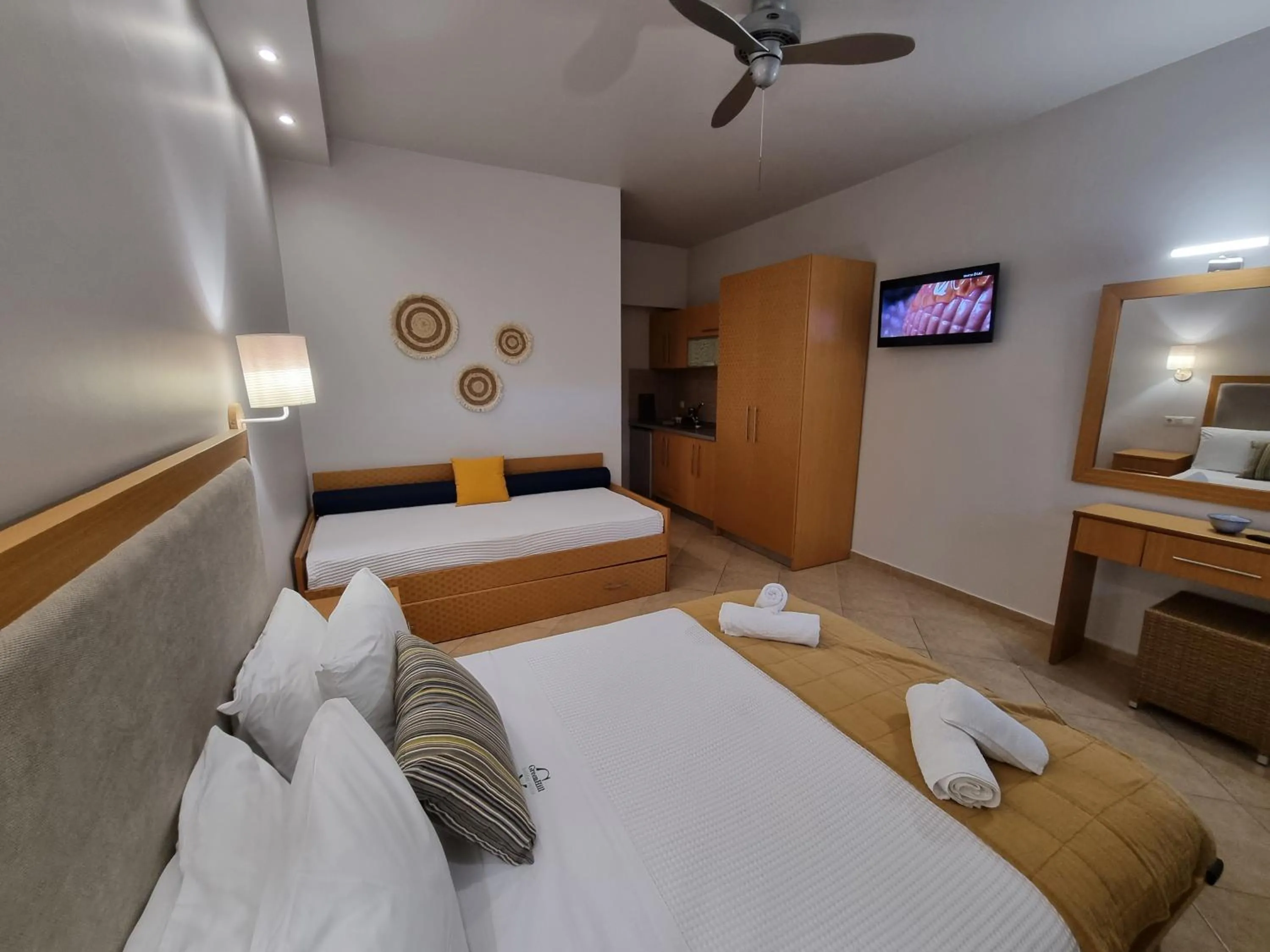 Bed in GreenHill Holiday Suites