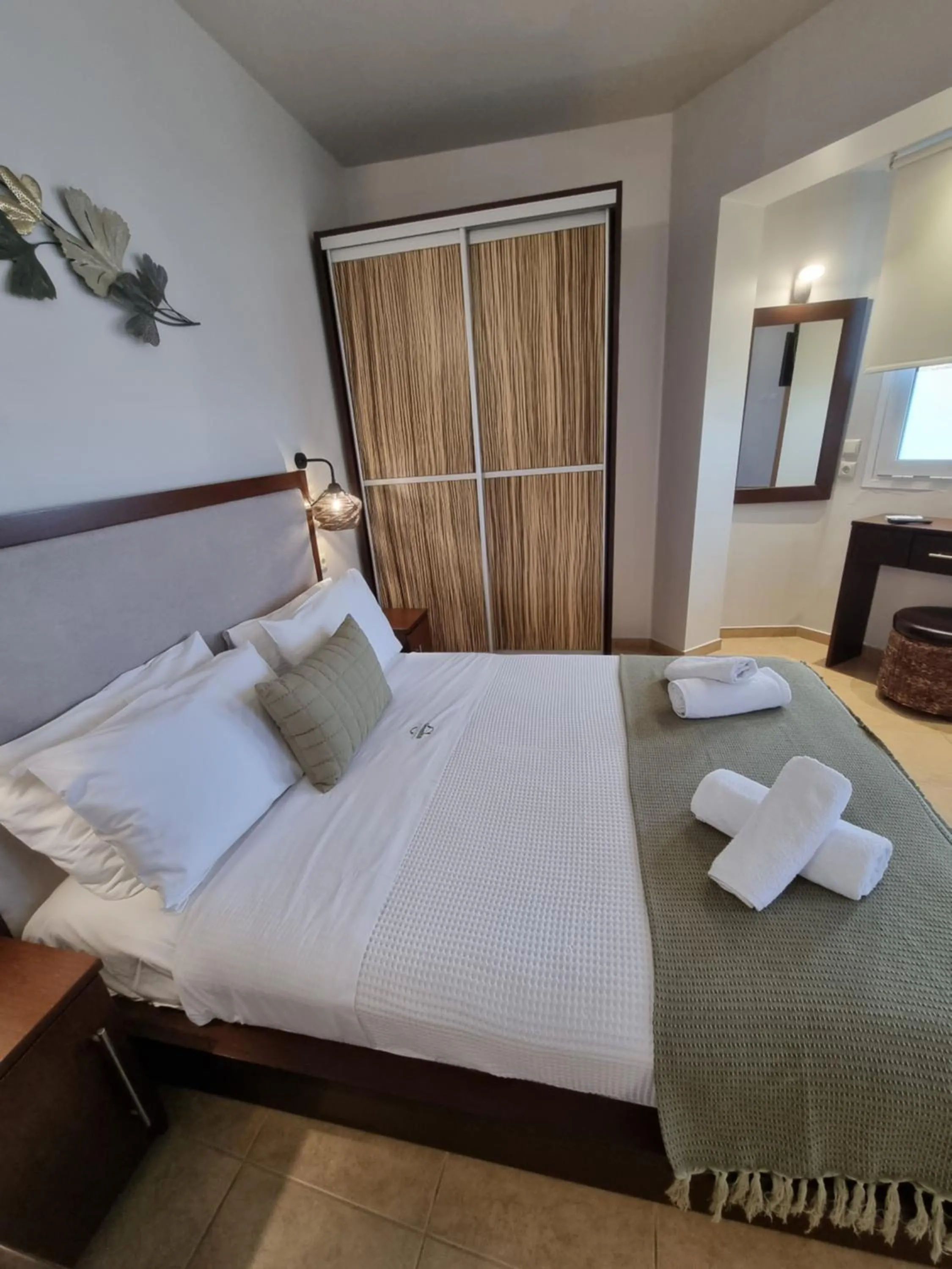 Bed in GreenHill Holiday Suites