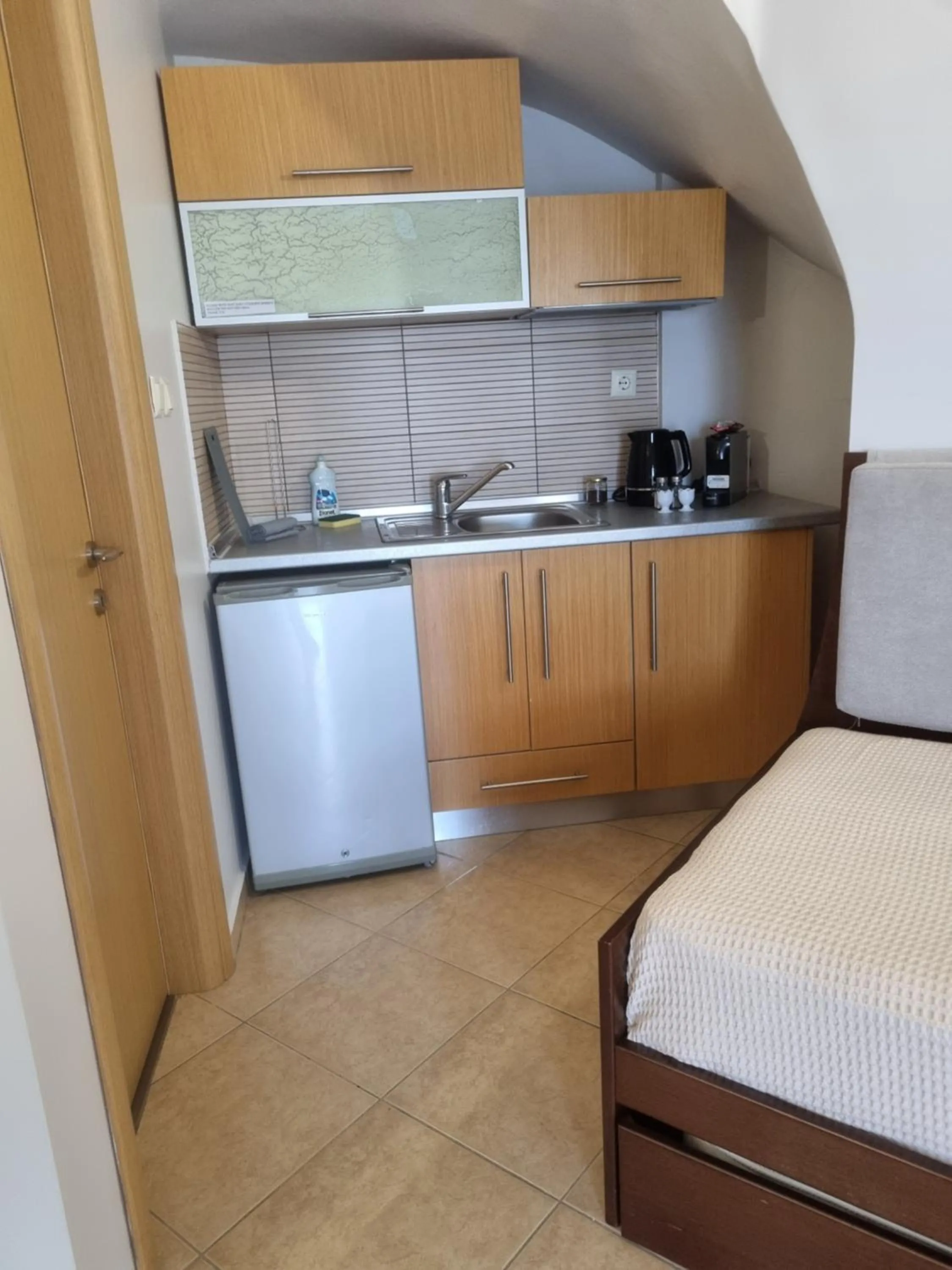 Bed in GreenHill Holiday Suites