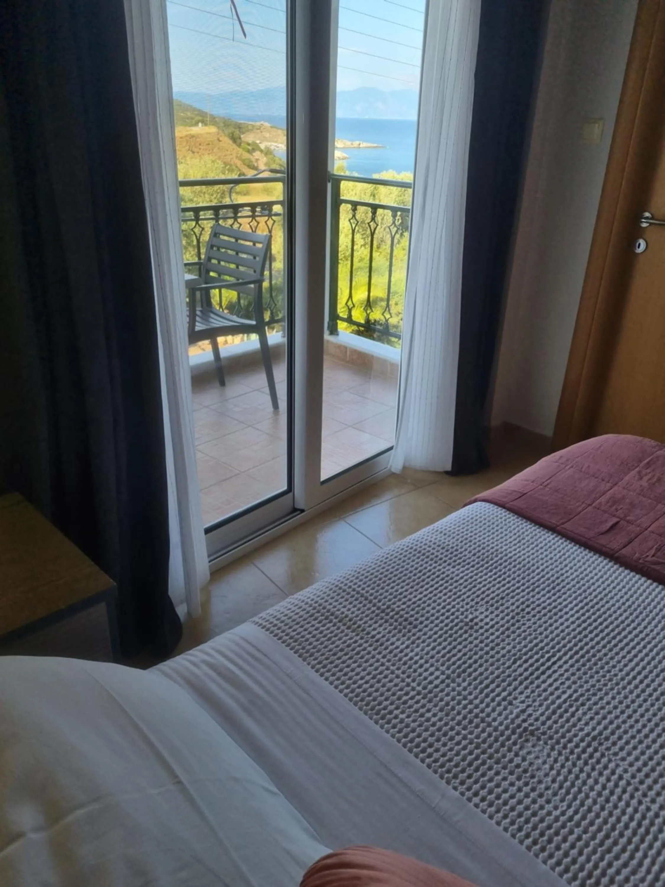 Bed in GreenHill Holiday Suites