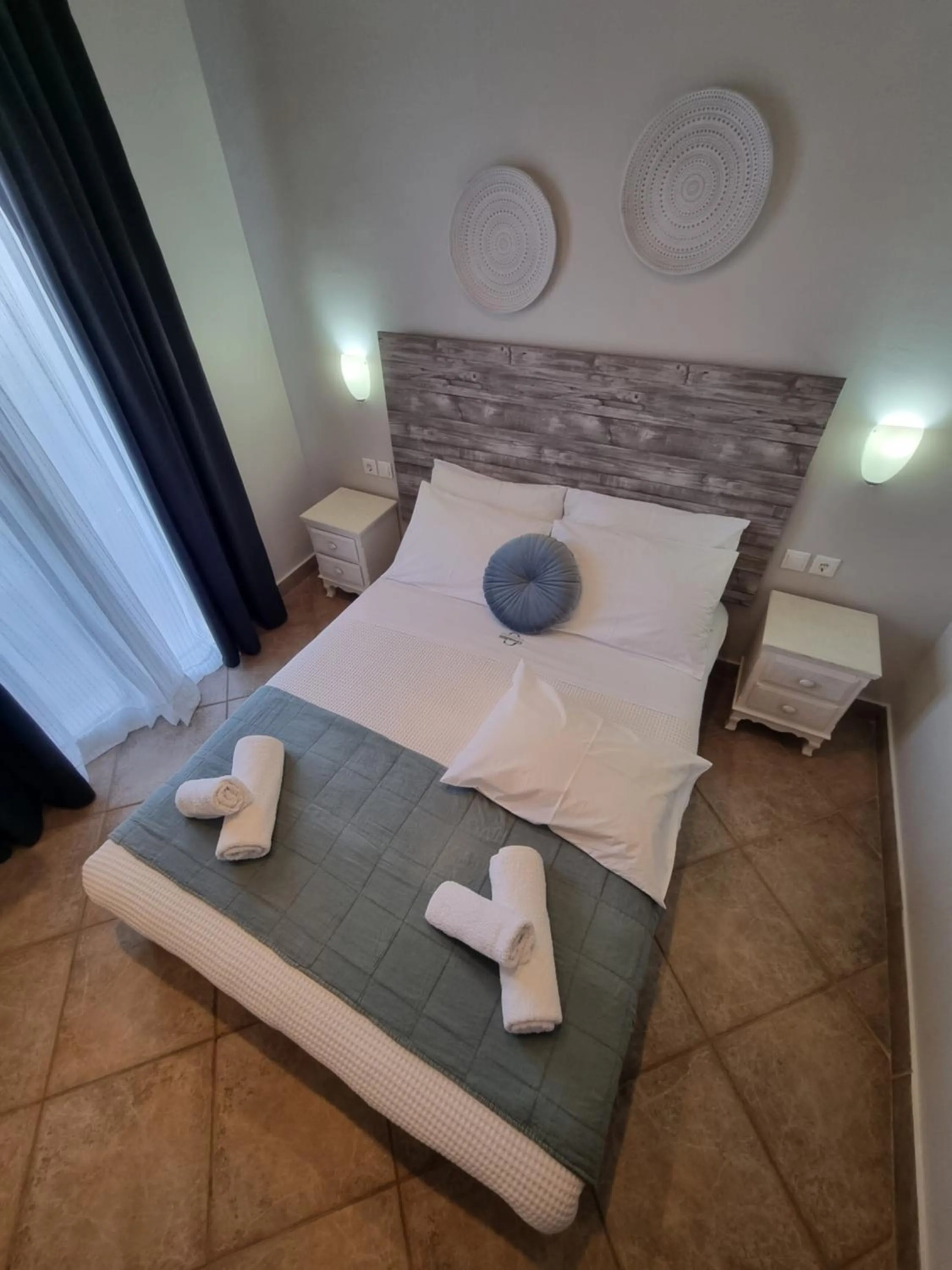 Bed in GreenHill Holiday Suites