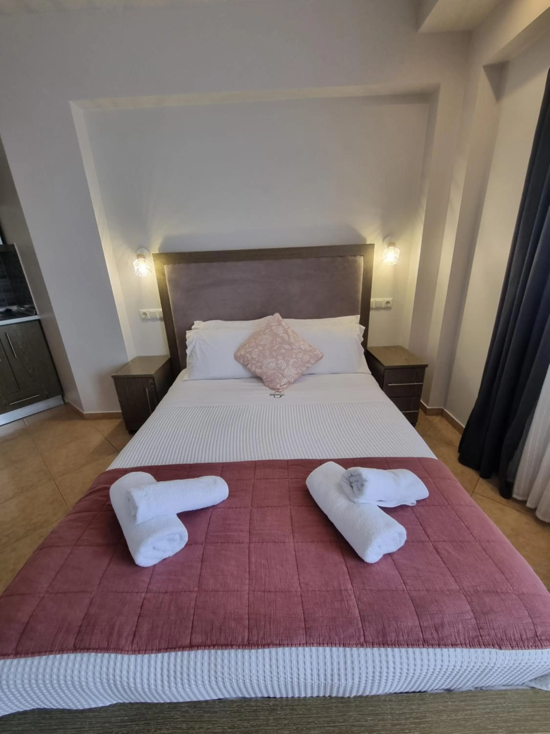 Bed in GreenHill Holiday Suites