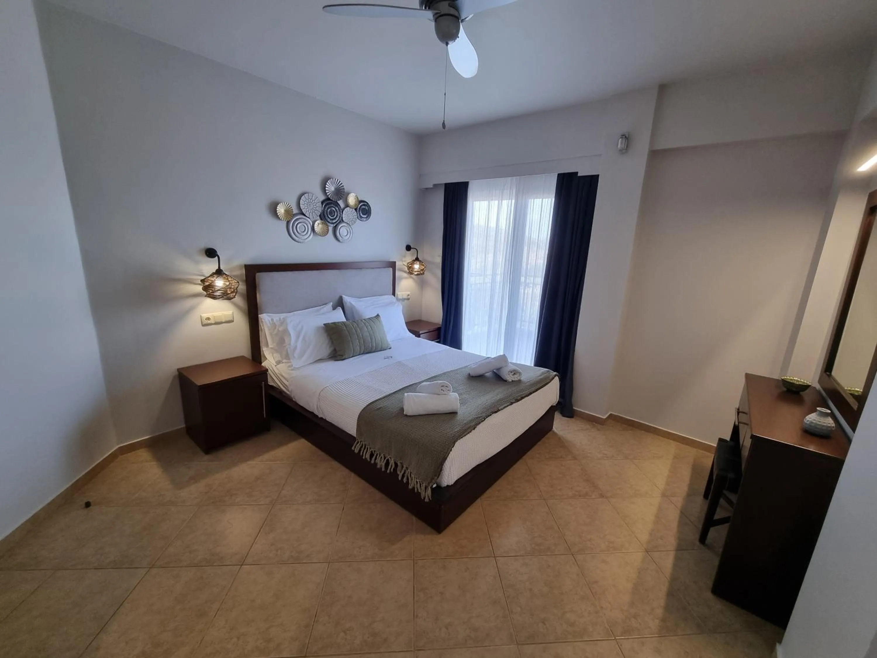 Bed in GreenHill Holiday Suites