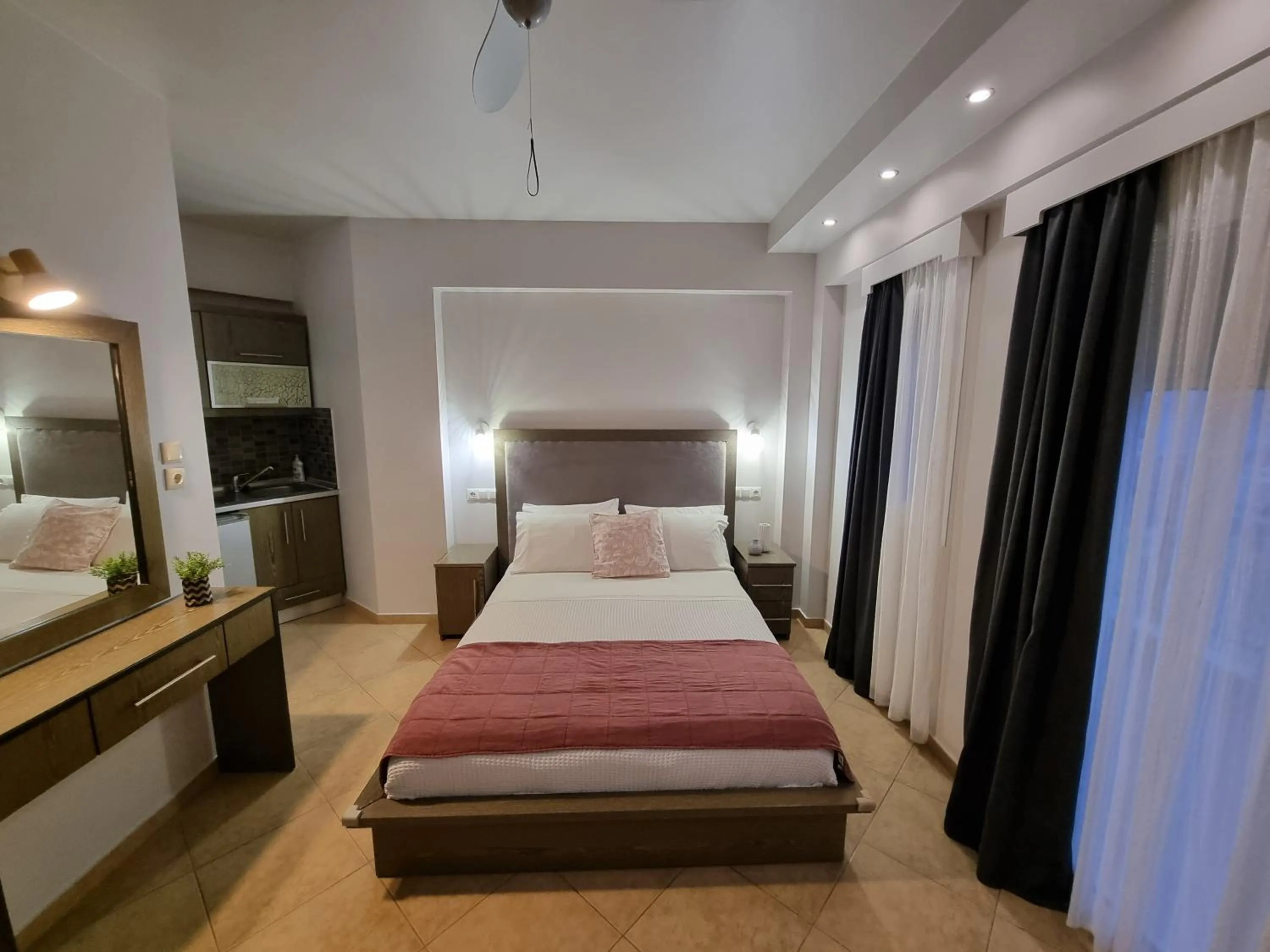 Bed in GreenHill Holiday Suites