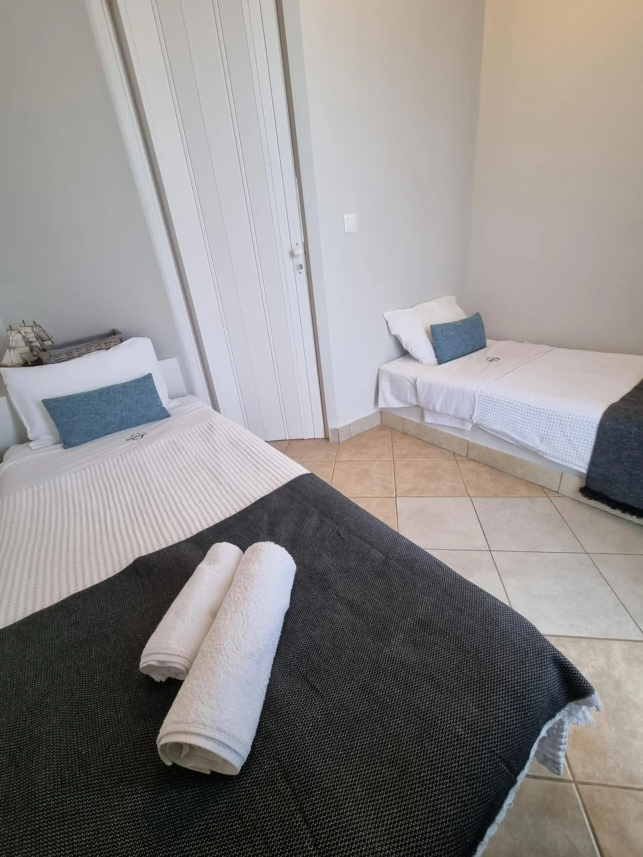 Bed in GreenHill Holiday Suites