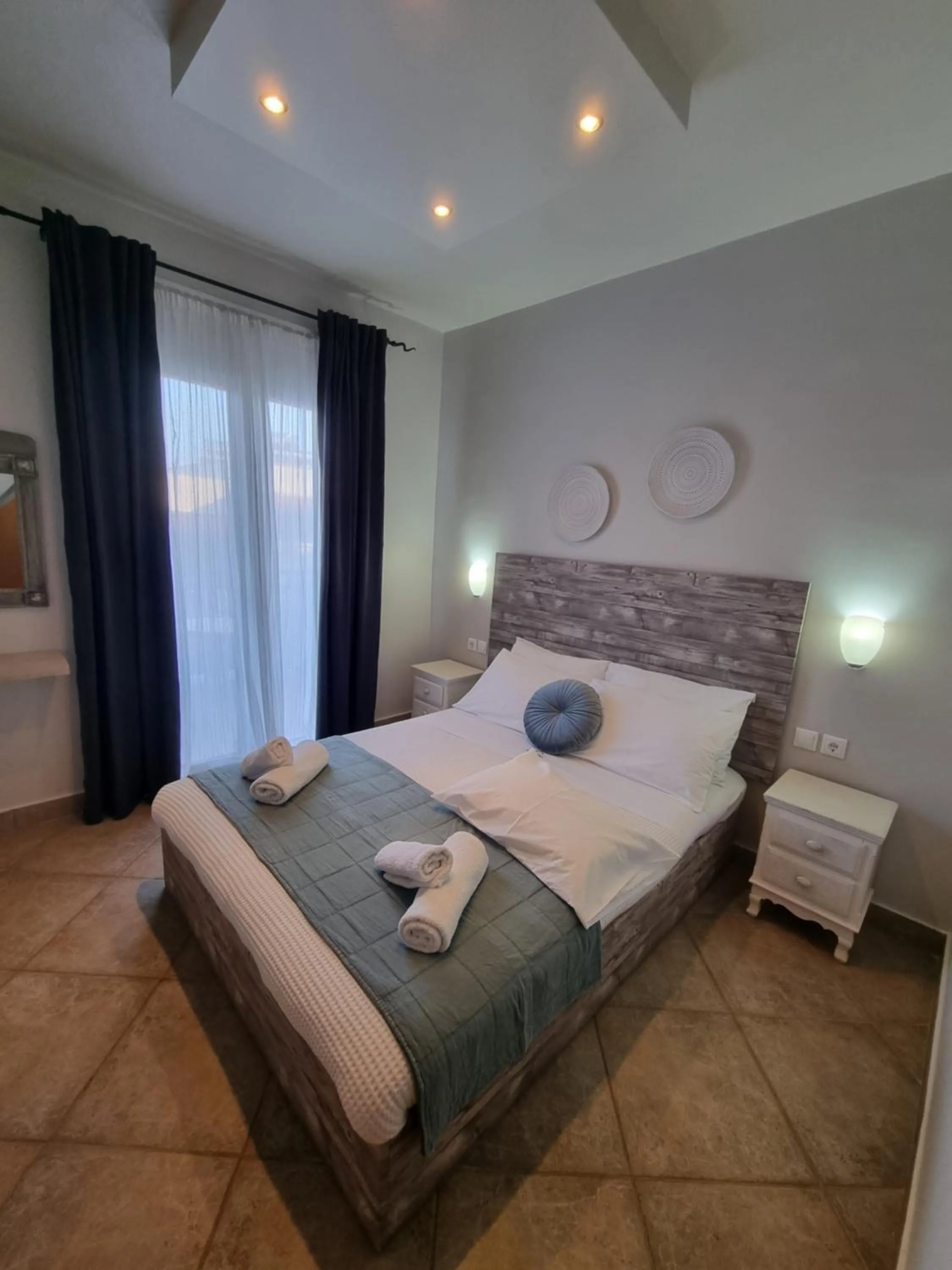 Bed in GreenHill Holiday Suites