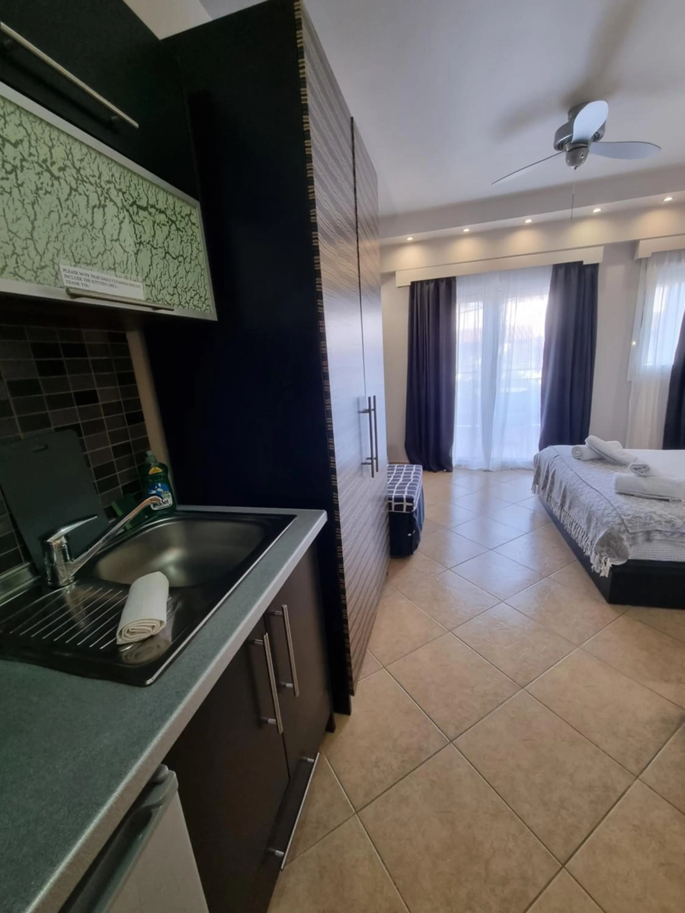 Bed in GreenHill Holiday Suites