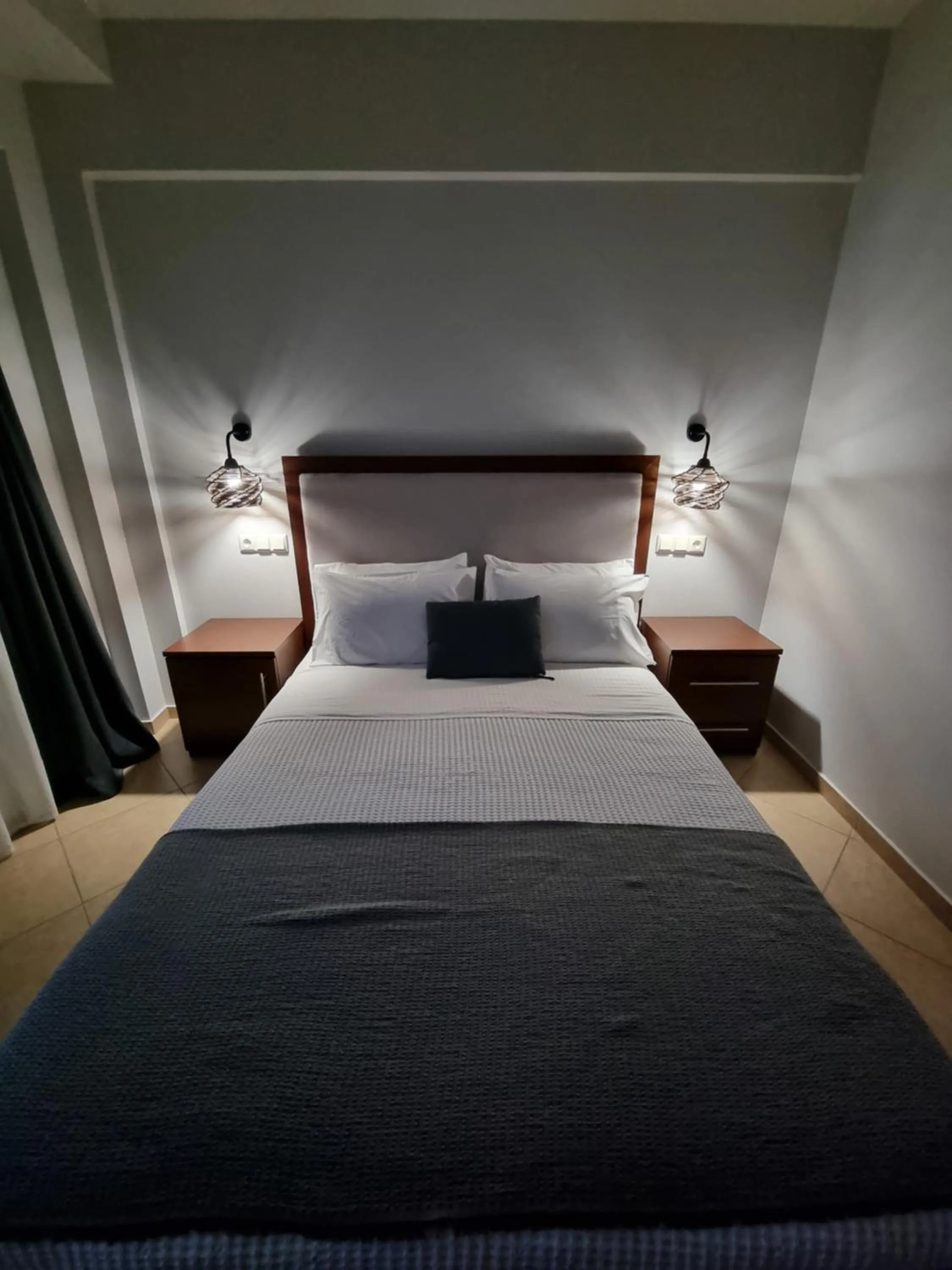 Bed in GreenHill Holiday Suites