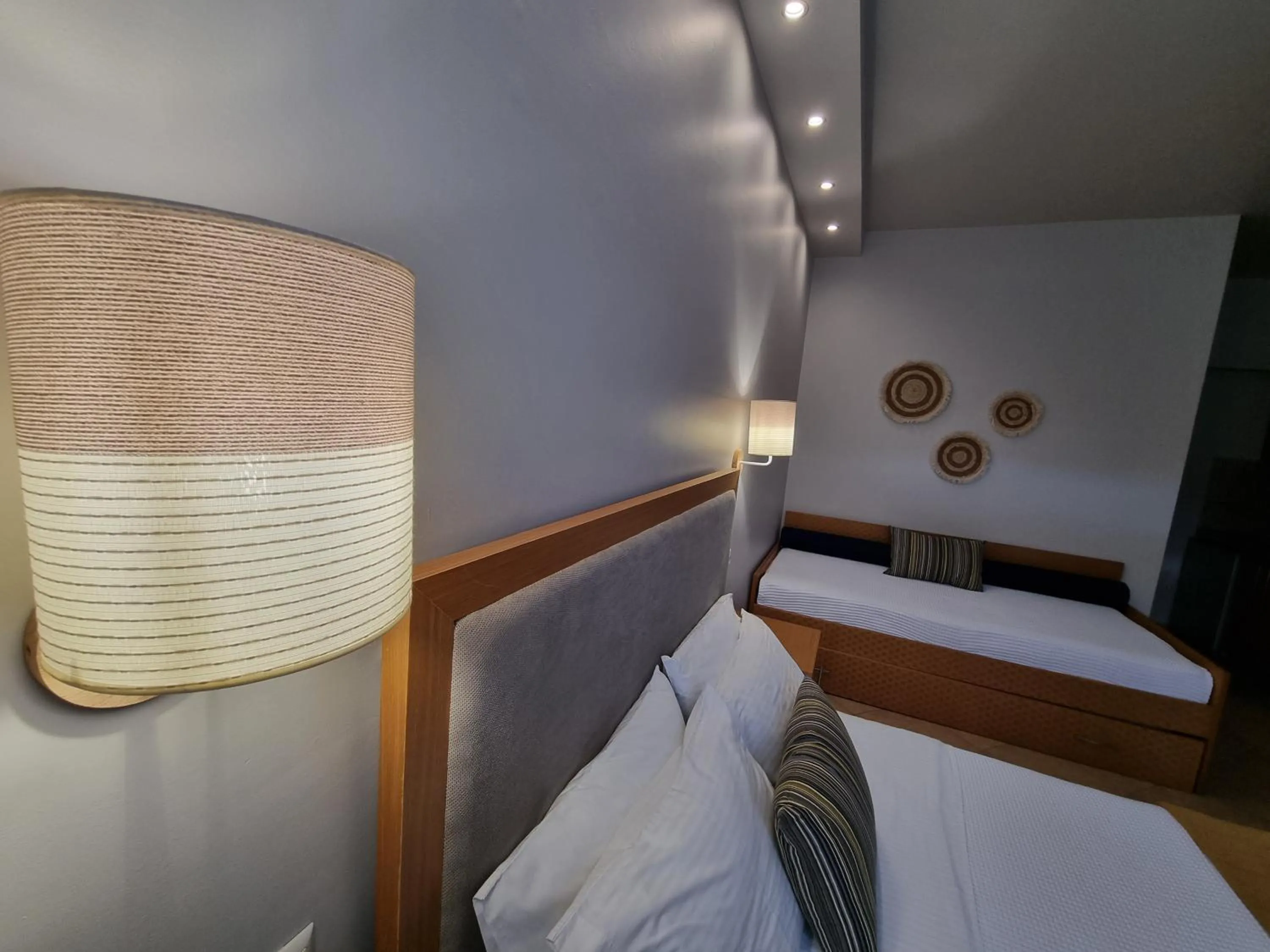 Bed in GreenHill Holiday Suites