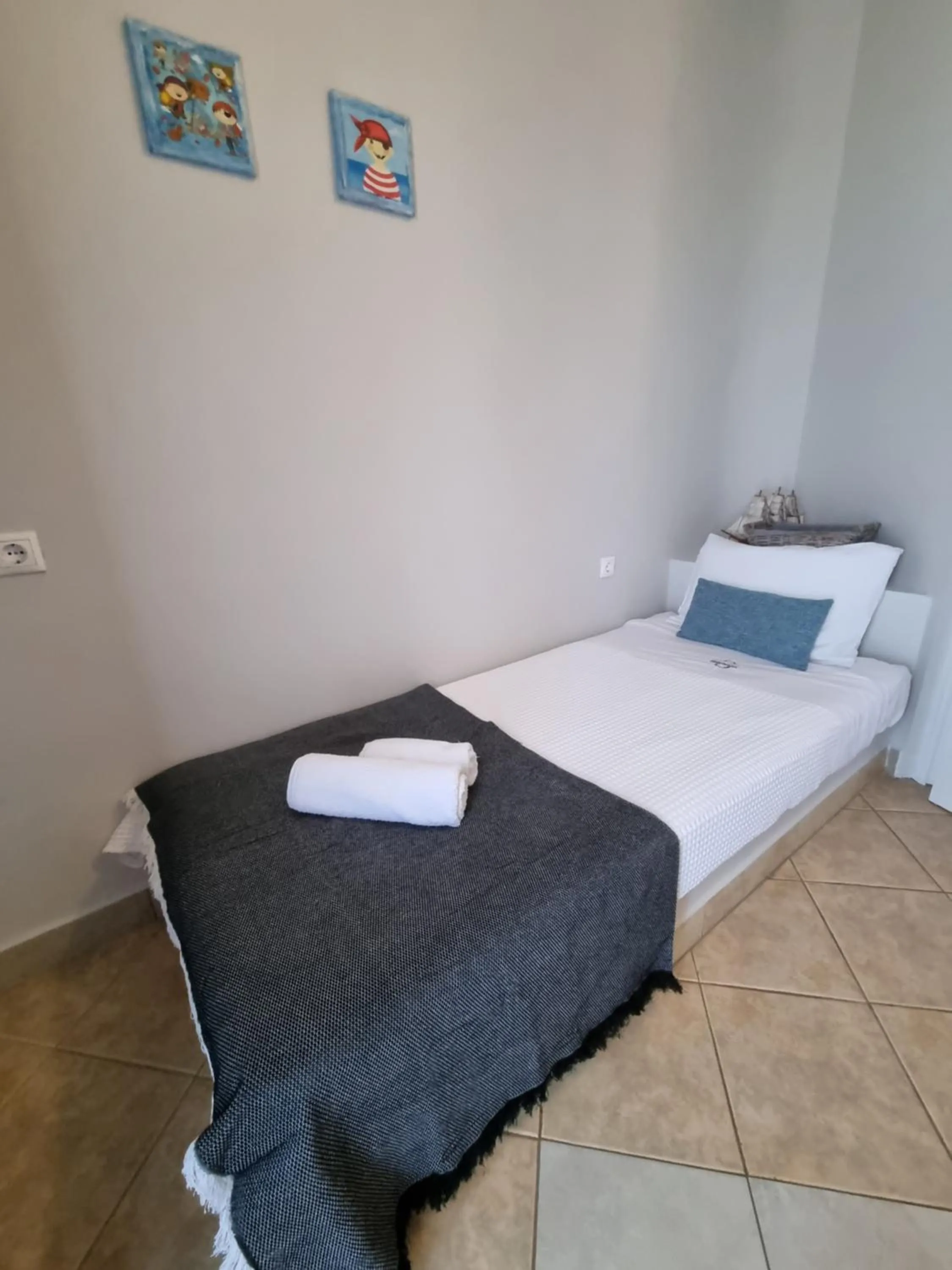 Bed in GreenHill Holiday Suites