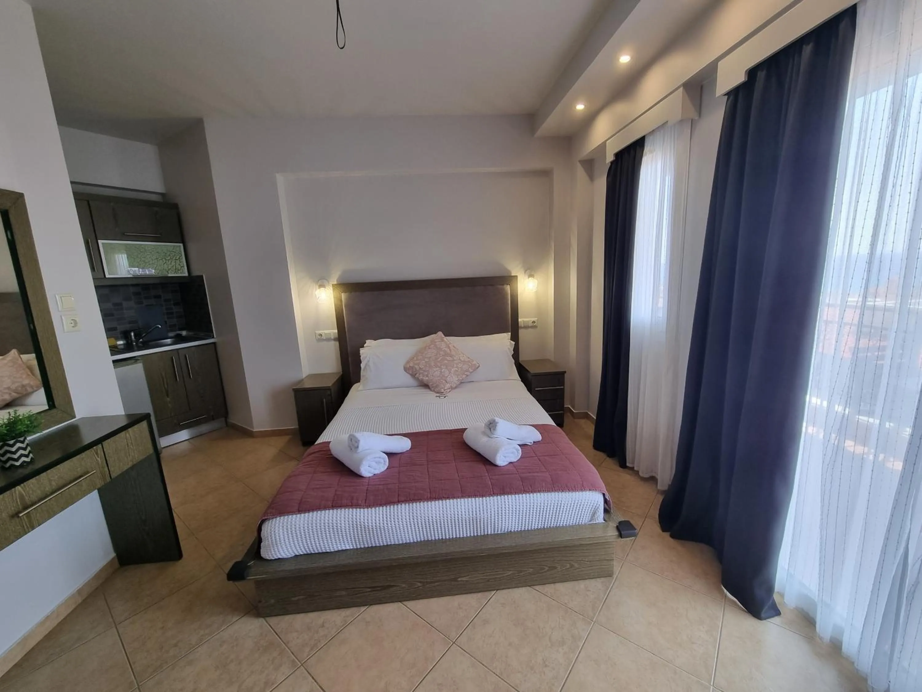 Bed in GreenHill Holiday Suites