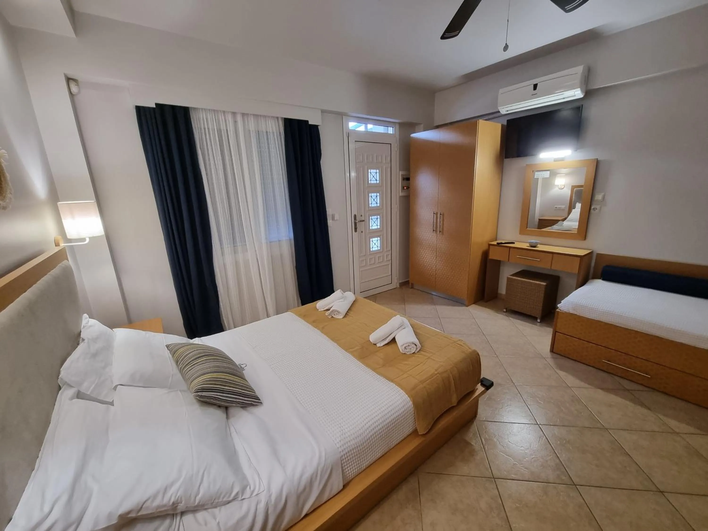 Bed in GreenHill Holiday Suites