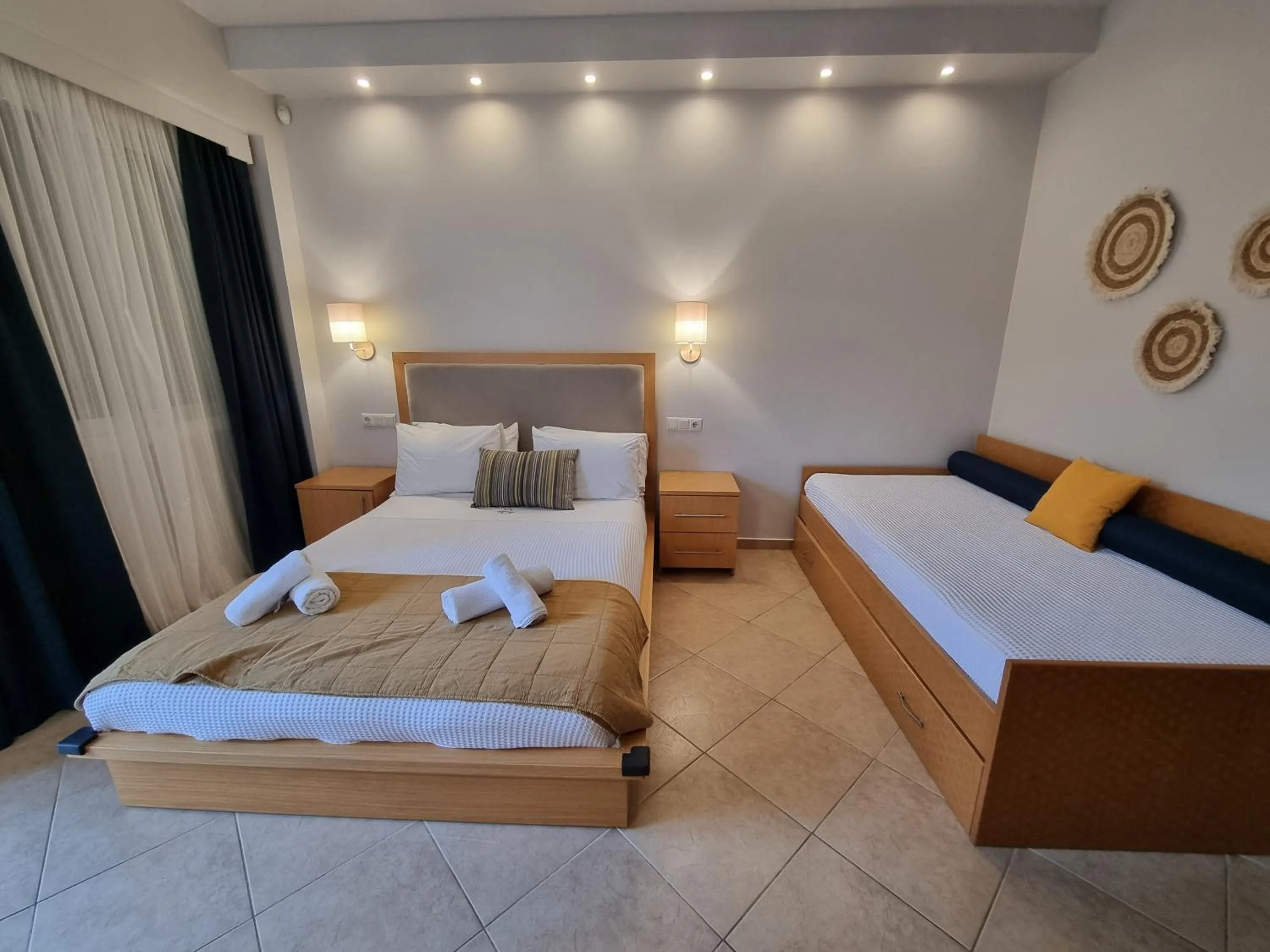 Bed in GreenHill Holiday Suites