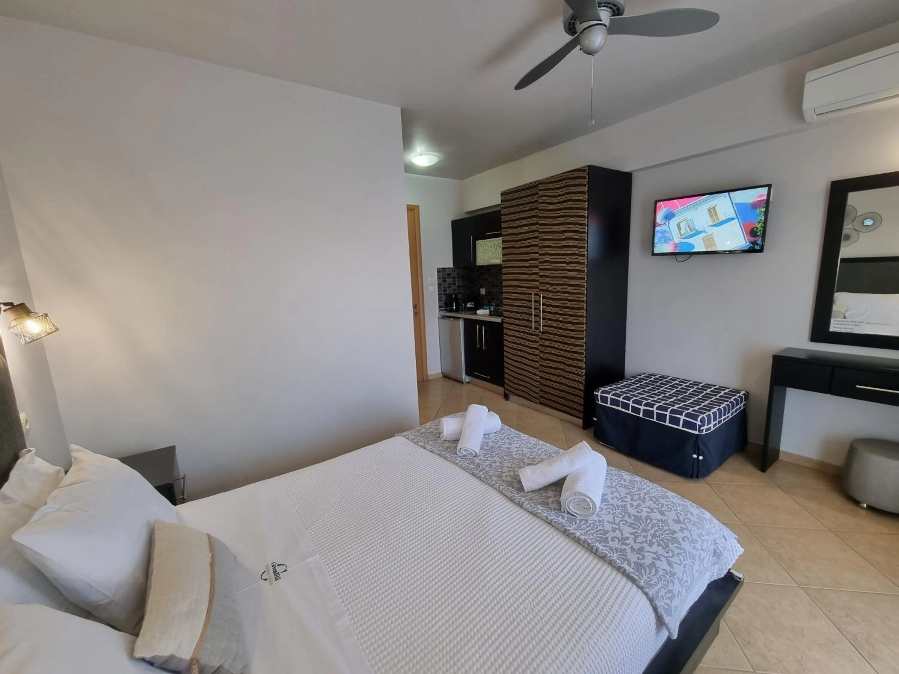 Bed in GreenHill Holiday Suites