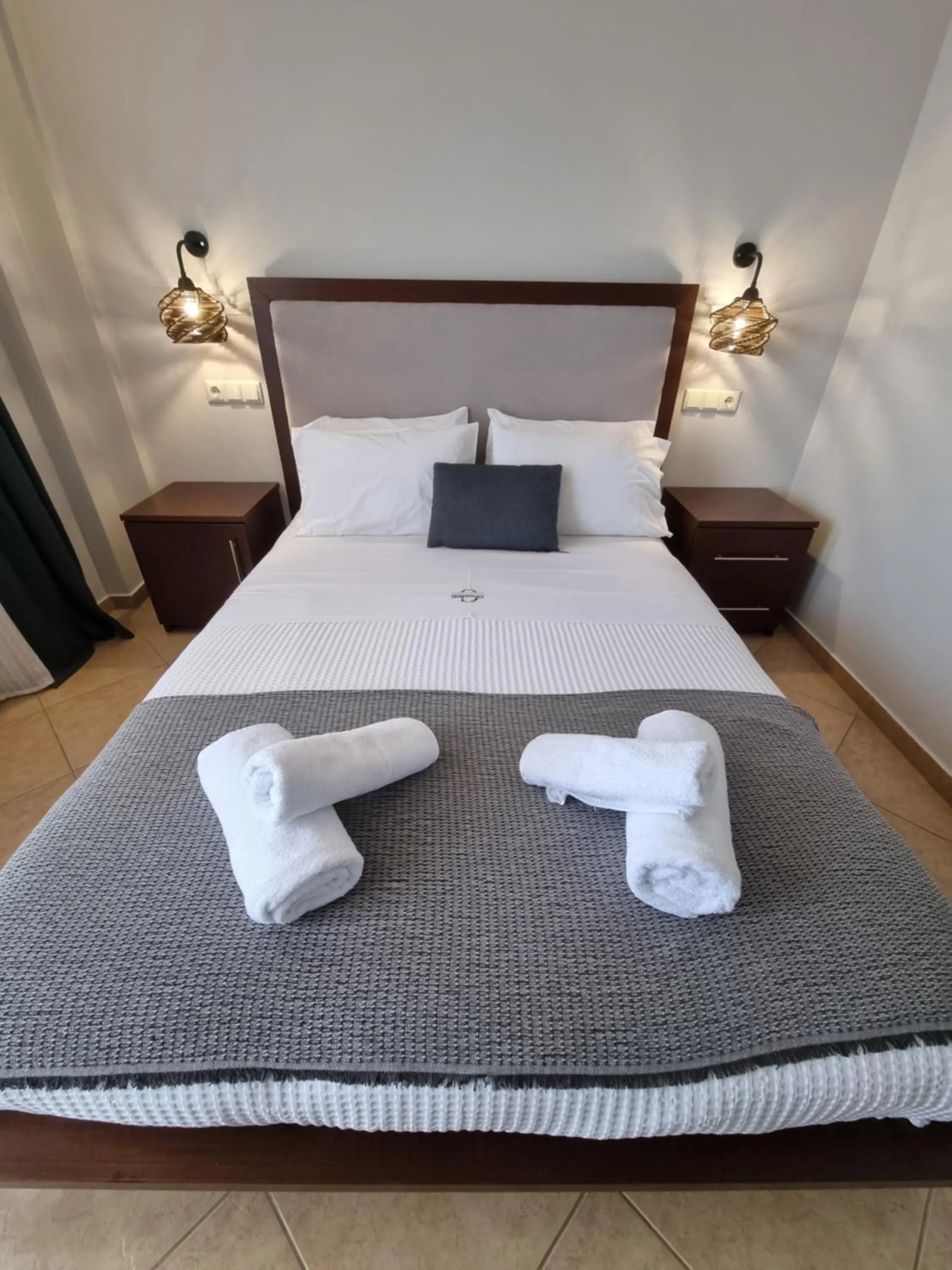 Bed in GreenHill Holiday Suites