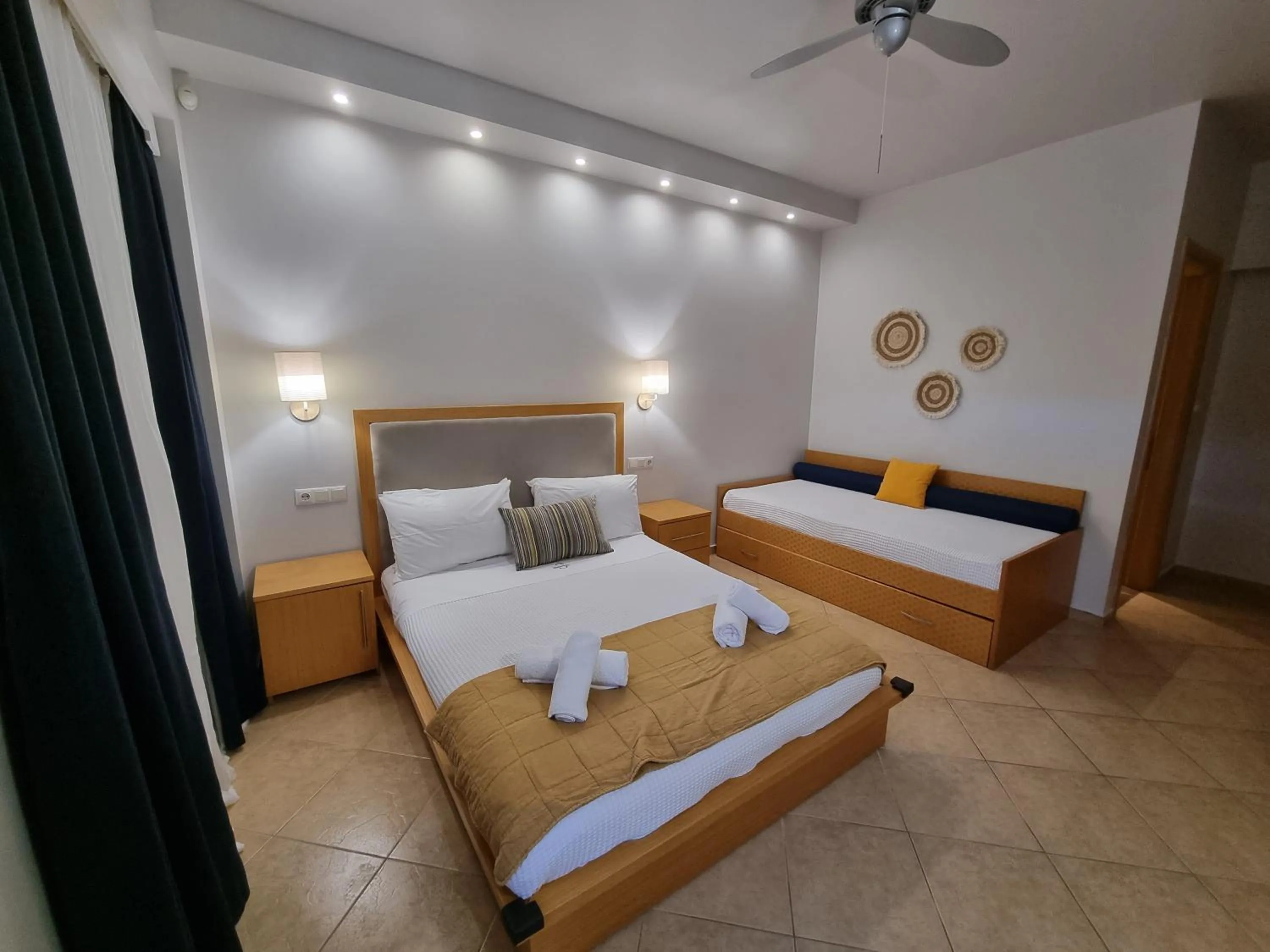 Bed in GreenHill Holiday Suites