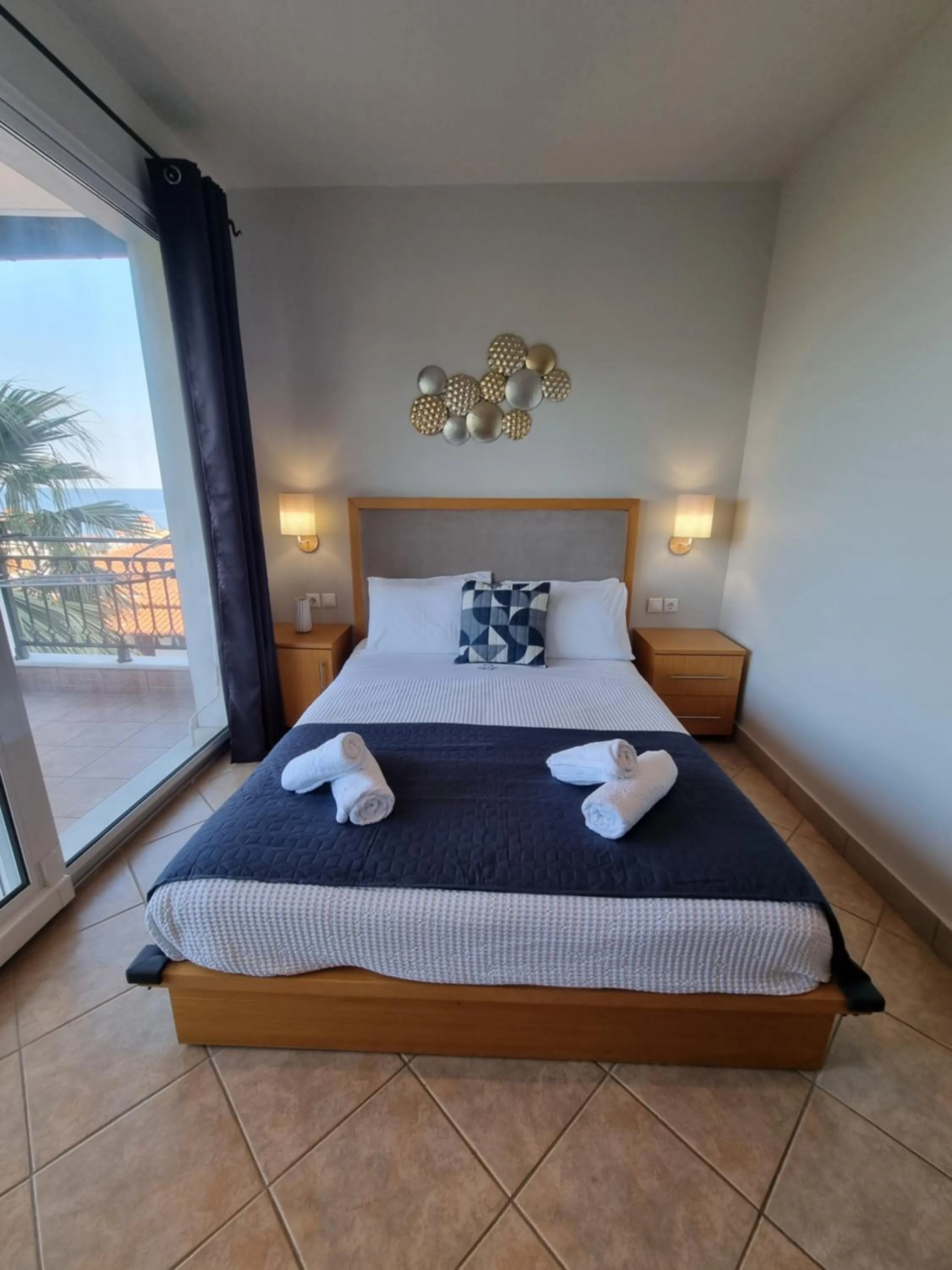 Bed in GreenHill Holiday Suites