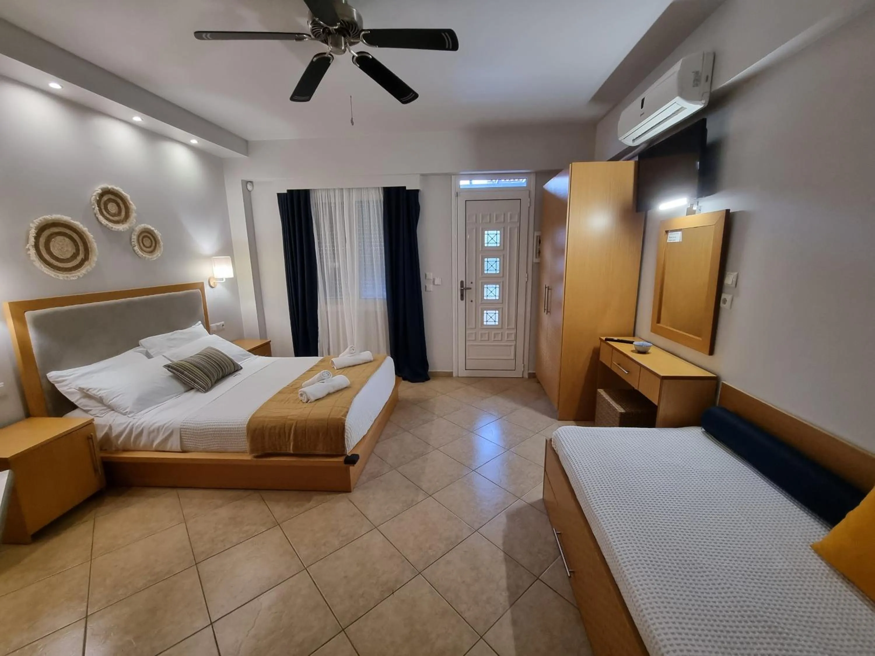 Bed in GreenHill Holiday Suites